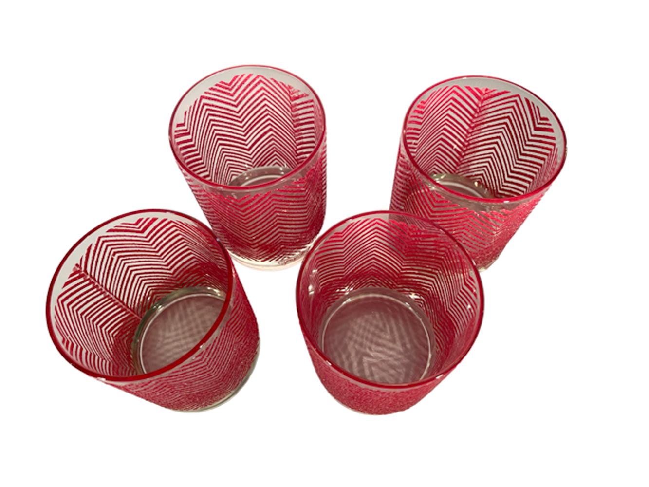 Set of 4 Georges Briard rocks glasses in a variant of his 'Icicle' pattern with red lines in raised textured frosty enamel arranged in a herringbone pattern.