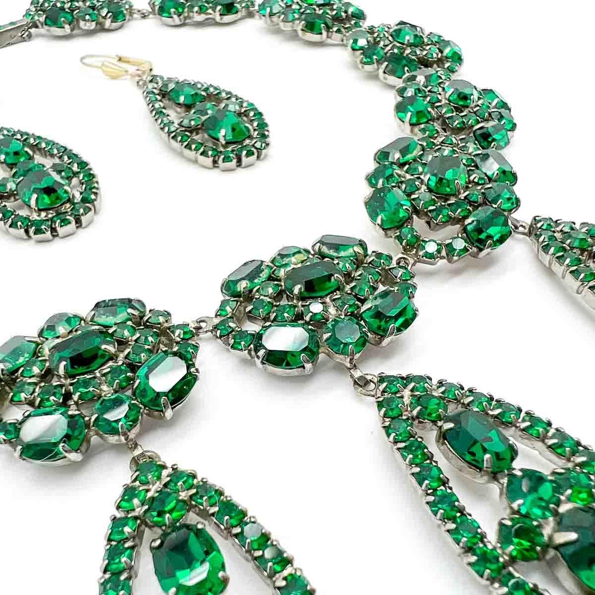 A divine Vintage Emerald Crystal Demi Parure. Inspired by Georgian jewellery designs this beautifully crafted demi-parure comprises a riviere style collar with droplets accompanied by a statement pair of matching, long teardrop earrings. The