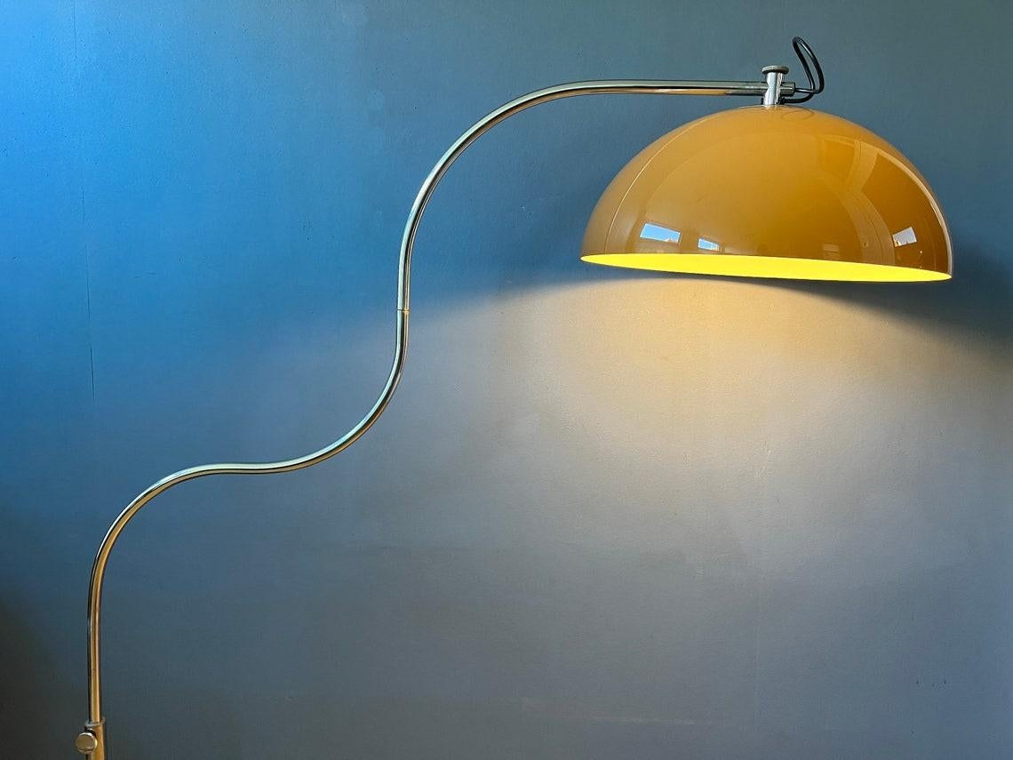 Very rare mushroom floor lamp by GEPO with flexible base. The shades produce a warm light and can be fixated at different points. The swing mechanism of the base allows you to position the lamp in any way desirable. Even the height of the lamp is