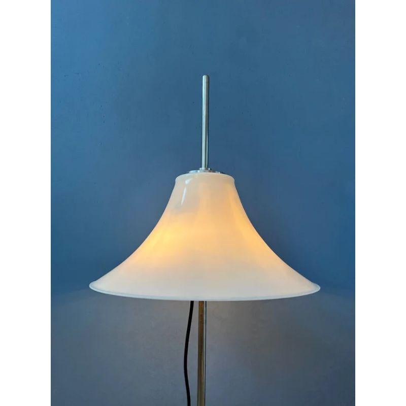 Very rare space age GEPO table lamp with white acryllic shade. The shade can be easily moved up and down the base. The lamp requires two E27 lightbulbs and currently has a EU-plug.

Dimensions:
ø Shade: 28 cm
Height: 60 cm

Condition: Very