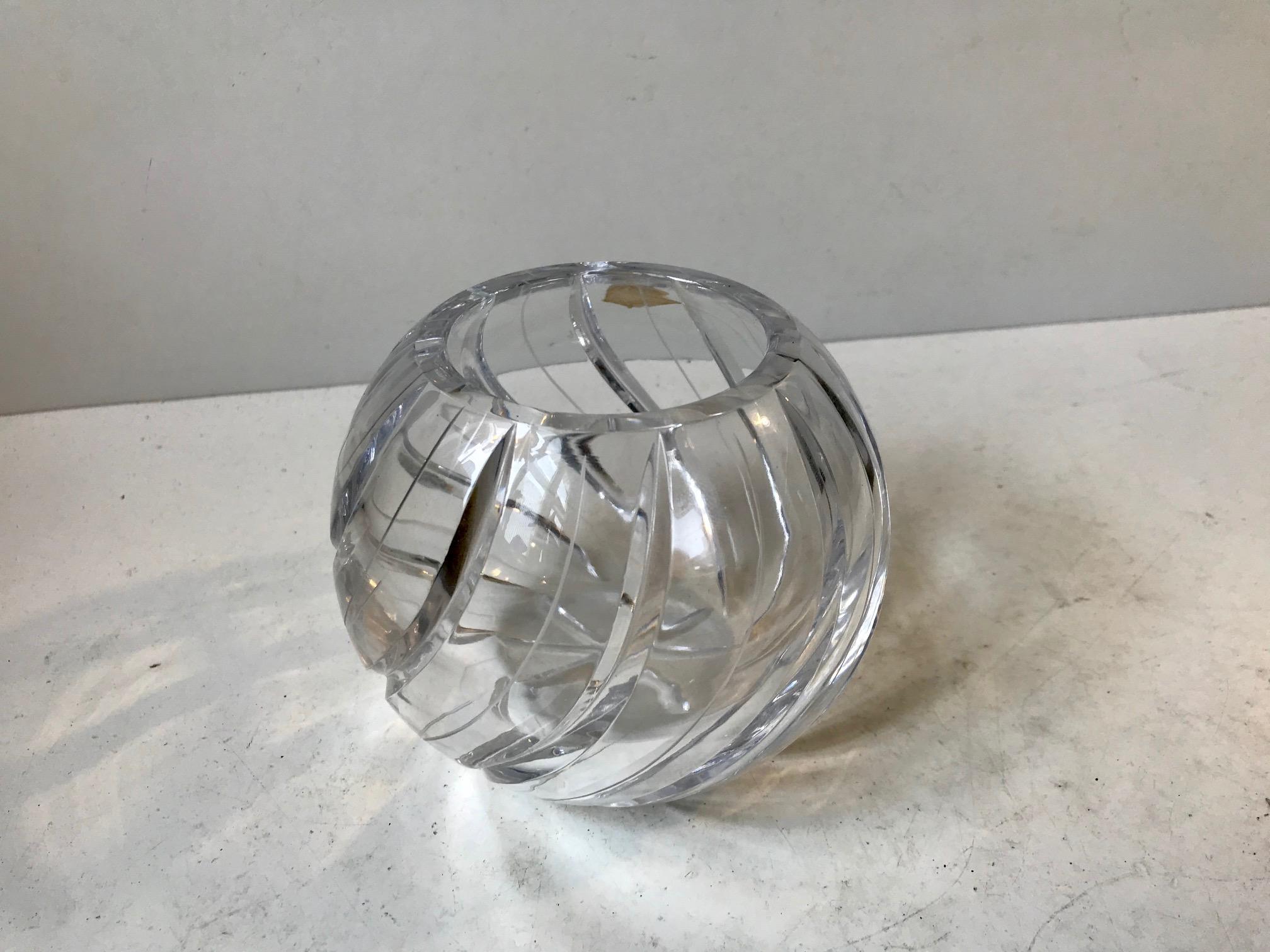 A hand-cut and finish lead crystal vase. Designed and manufactured in Germany during the 1950s in a style reminiscent of Baccarat, Daum and Lorranie.