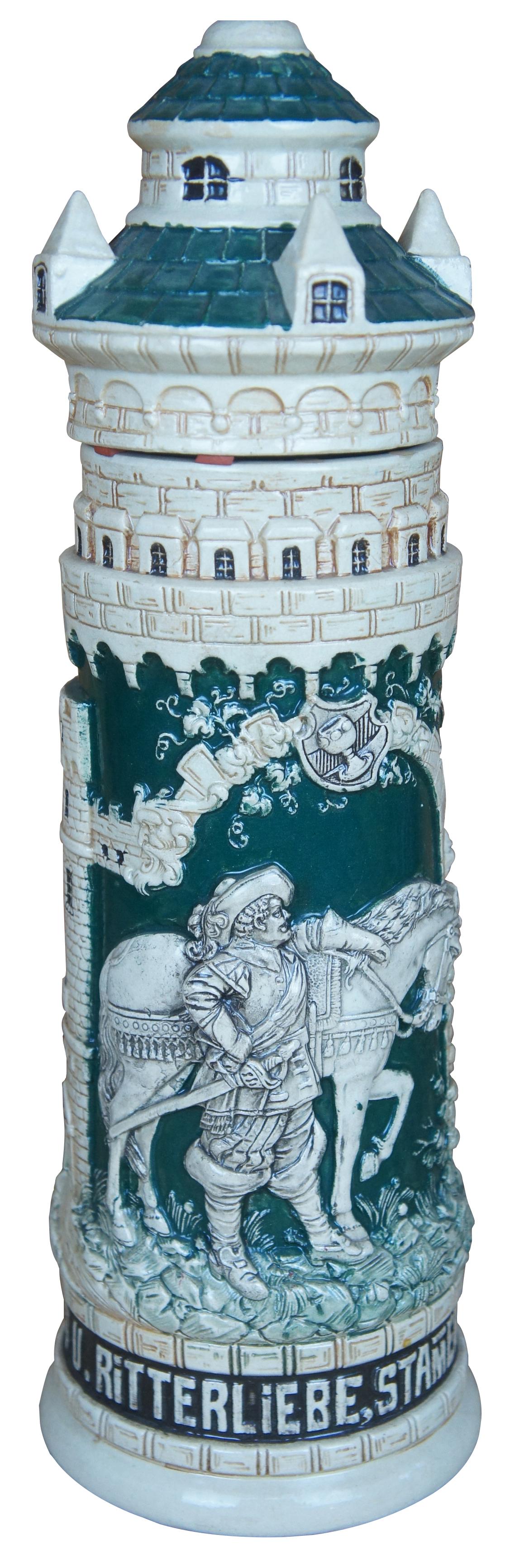 Vintage German earthenware pottery stein featuring high relief form depicting a noble woman in a tower addressing a courtly knight on horse. Text reads: “Rebensaft u. Ritterliebe stammen aus edlen Trieben.” (Wine and knightly love come from noble