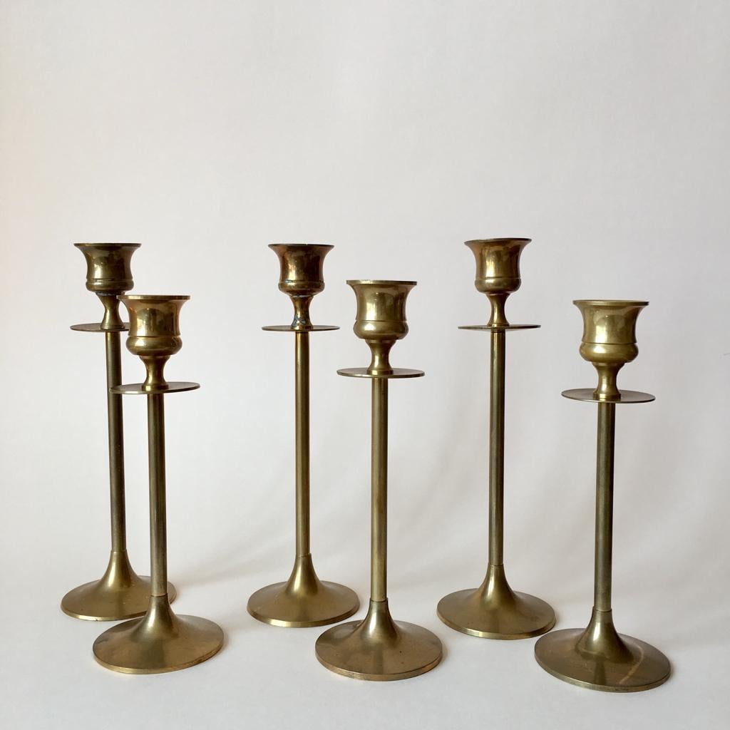 Set of six brass candleholders, made of solid brass. 2 different sizes.

Measures: Small H 17.5/D 6.5 cm
Big H 20.5/D 6.5 cm.