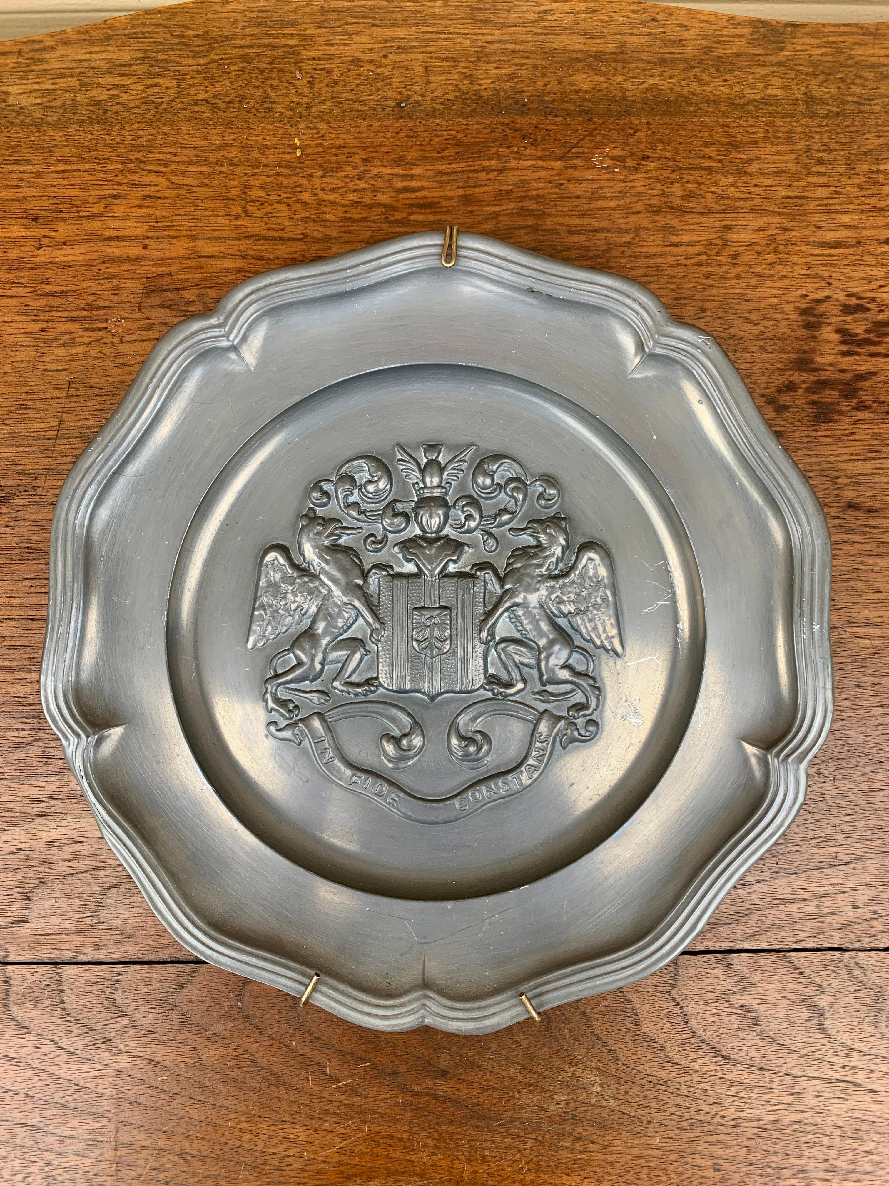 A beautiful pewter wall plate featuring a heraldic coat of arms with a knight

Germany, Mid-20th Century

Measures: 9