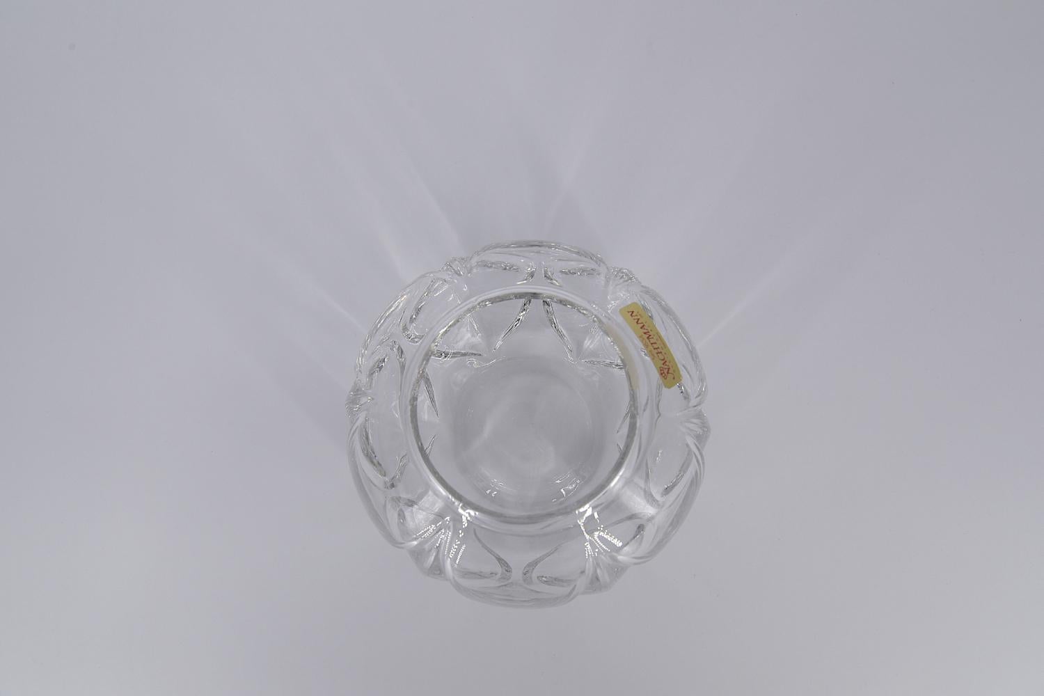 This spherical vase was made by the German glass factory Nachtmann during the 1960s. The vase is made of high quality 24% Bleikristall 24% lead crystal. It has decorative motifs.

The Nachtmann Manufactory was founded in 1834 by Michael Nachtmann