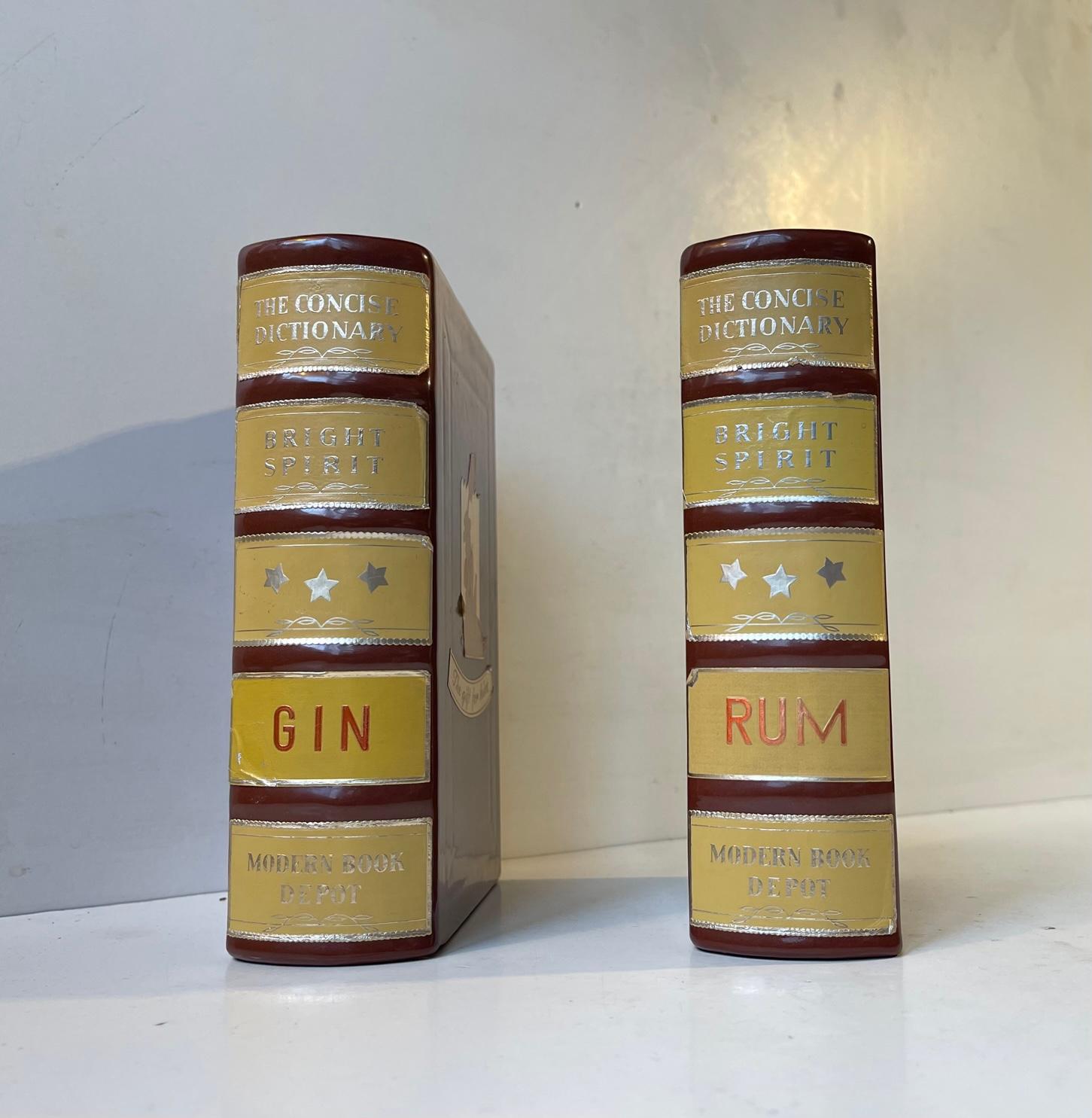 A novel set of decanters: Rum and Gin disguised/consealed as Dictionaries. Made in West Germany circa 1960-1970 by Enorm. Humorous stickers to one side saying The Gift to him. Measurements: 18x12x5.5 cm. The price is for the set.