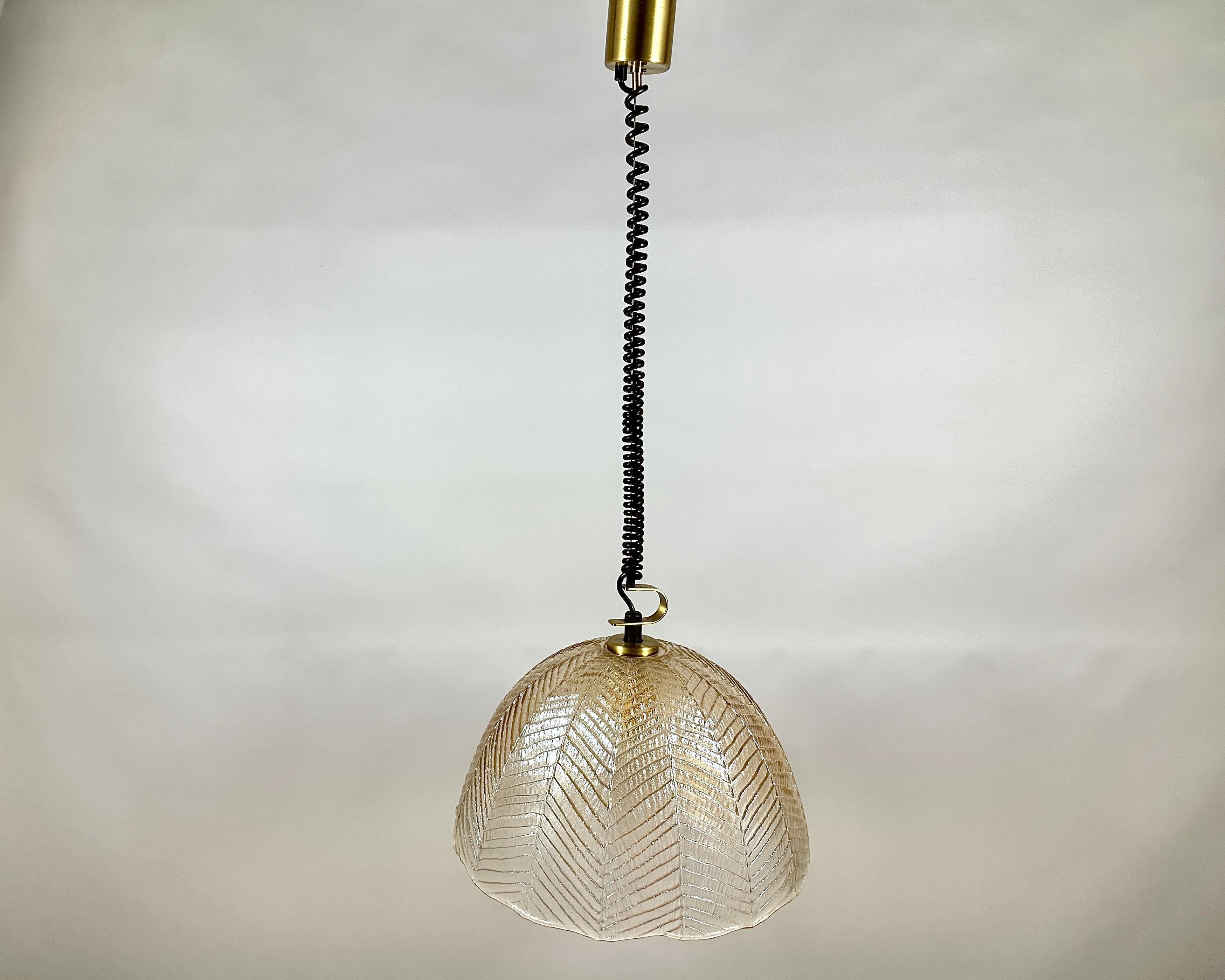 Vintage pendant lamp from the renowned German manufacturer, Peil & Putzler.

This exquisite piece embodies the best of Mid-Century Modern design, offering both functional illumination and a striking decorative statement.

Crafted in Germany in the