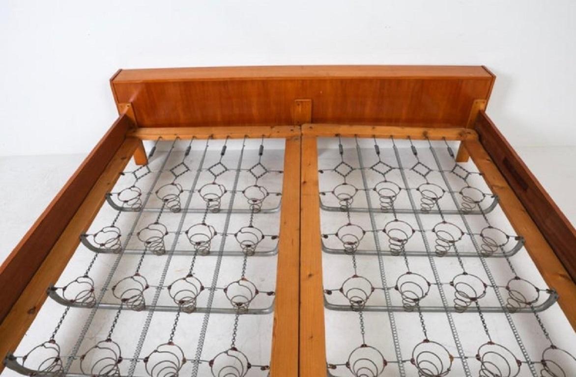 Woodwork Vintage German Modern King size teak bed frame with springs For Sale