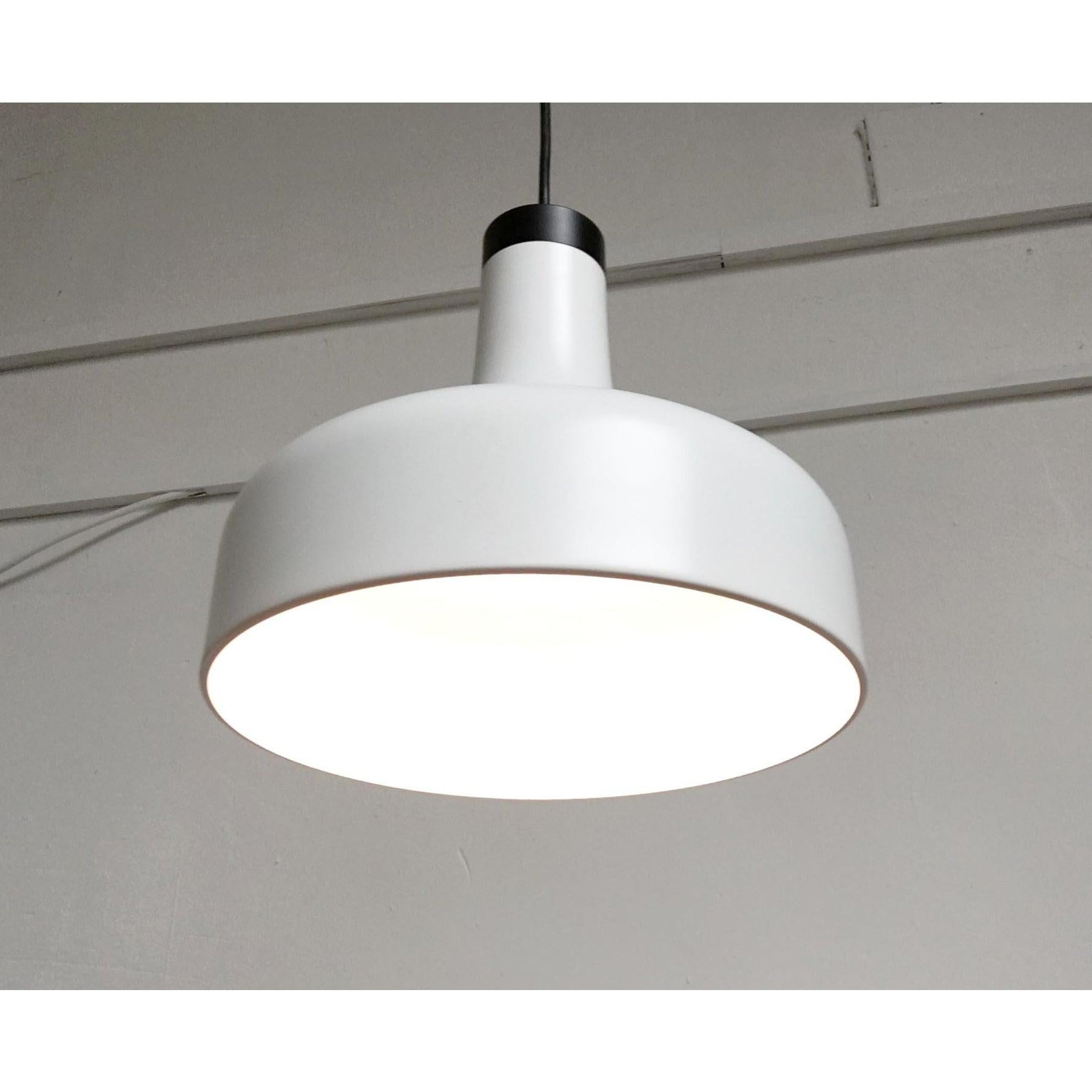 2 sleek pendant lamps from the well-known manufacturer Staff Leuchten, Germany.

The shape of the shade is tulip-shaped. In the upper part the lamp is very slim and widens down to full width. The light is directed directly downwards. Perfect for a