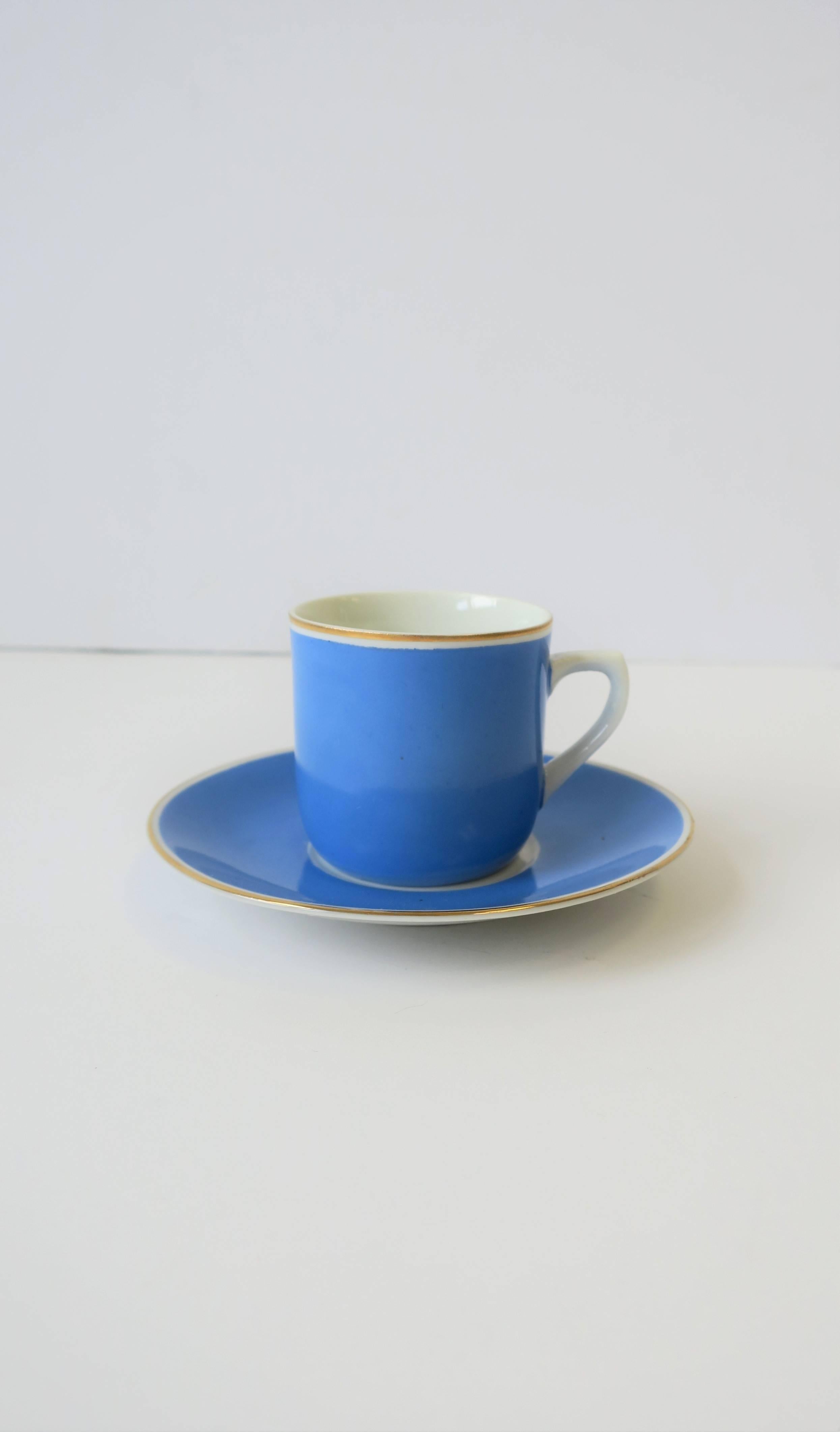 A beautiful midcentury German porcelain blue and white espresso coffee demitasse cup and saucer, circa mid-1940s Germany. Cup and saucer have a beautiful thin gold detail around edge. Pieces are marked Bavaria, Germany, US Zone, as show in image #6. 