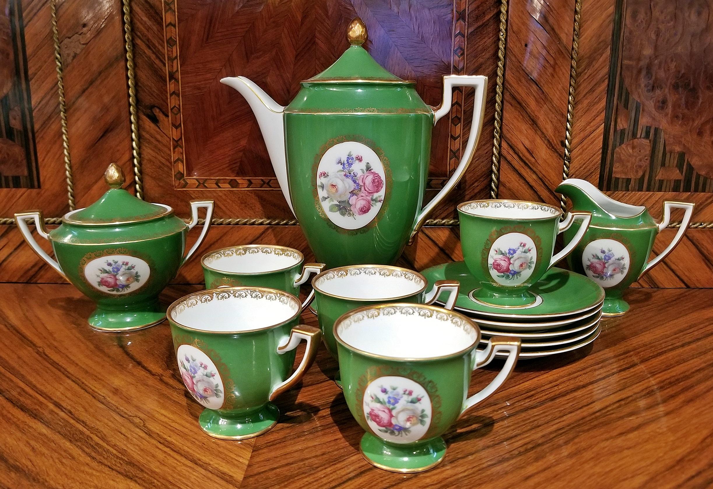 Complete porcelain/china coffee set……coffee pot, creamer, sugar bowl and 5 cups and saucers.

German…… Royal Tettau 1794……fully marked…….”Royal Tettau”….”Germany”……”US Zone”.

Marked for 1946-1949.

Green exterior with white interior. The