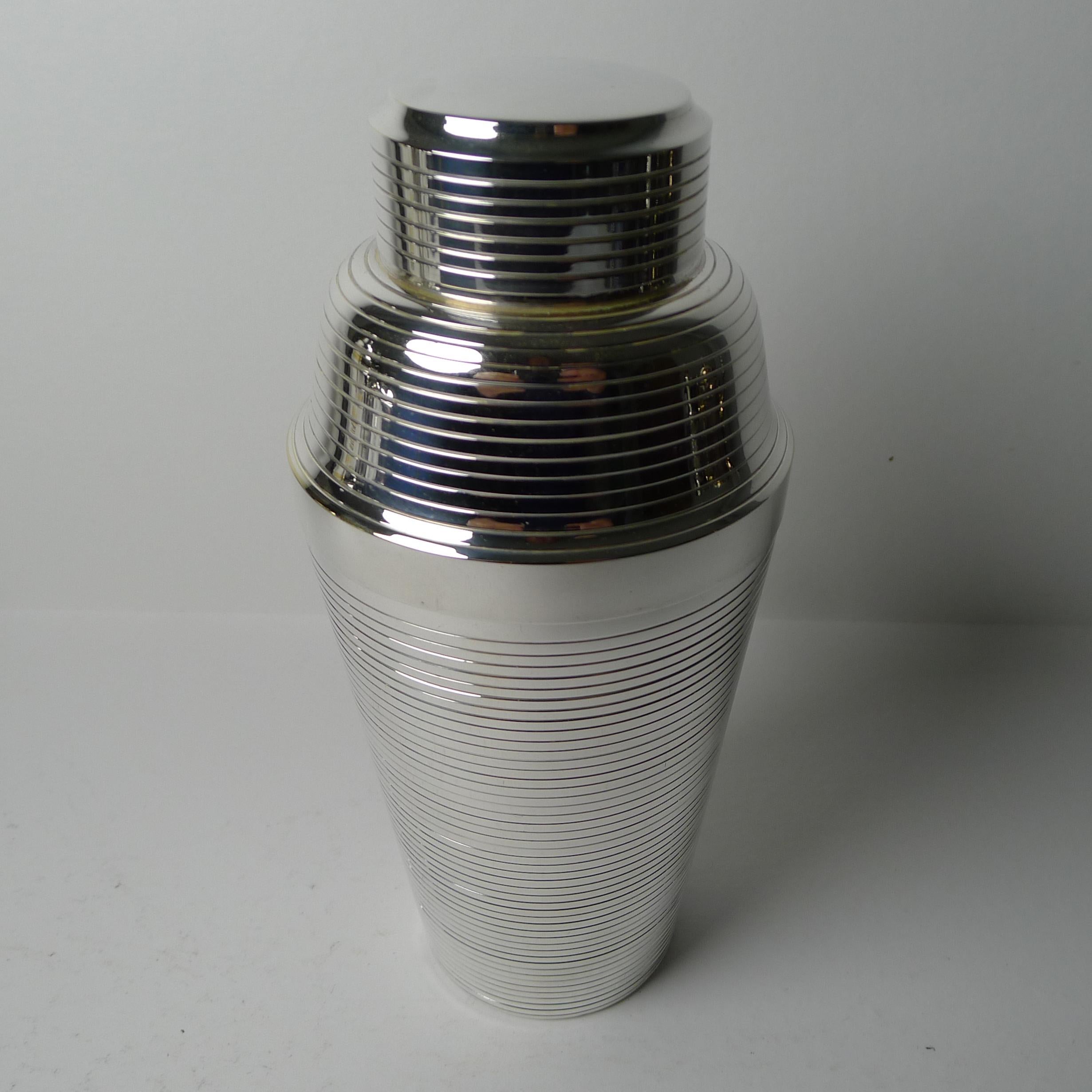 A handsome streamliner cocktail shaker by the well renowned Carl Deffner of Esslingen.

Just back from our silversmith's workshop where it has been professionally cleaned and polished, restoring it to it's former glory minor interior wear