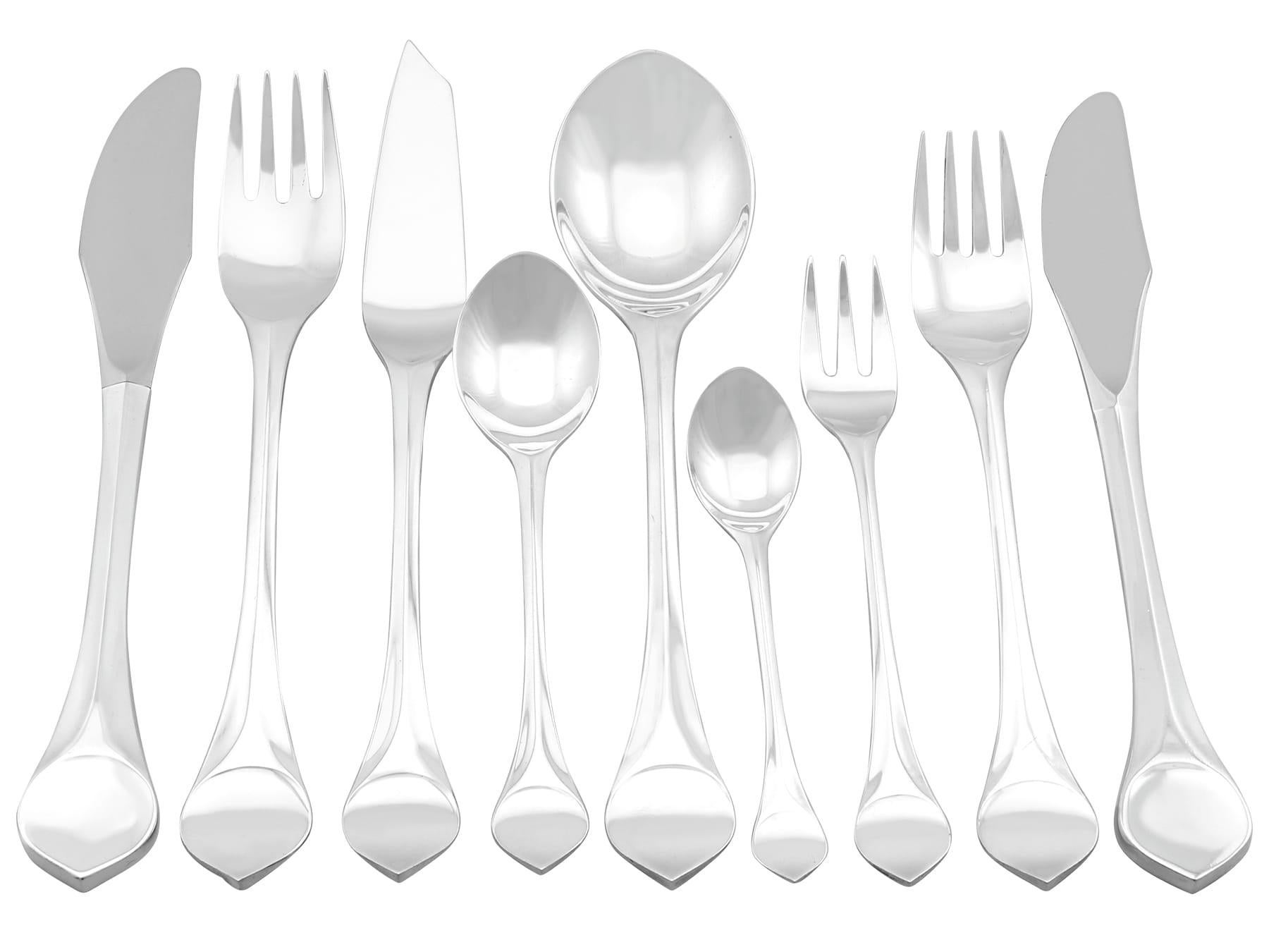 An exceptional, fine and impressive vintage German sterling silver Lotus pattern canteen of cutlery for twelve persons made by Rosenthal; an addition to our antique flatware sets

The pieces of this exceptional and extensive vintage German sterling