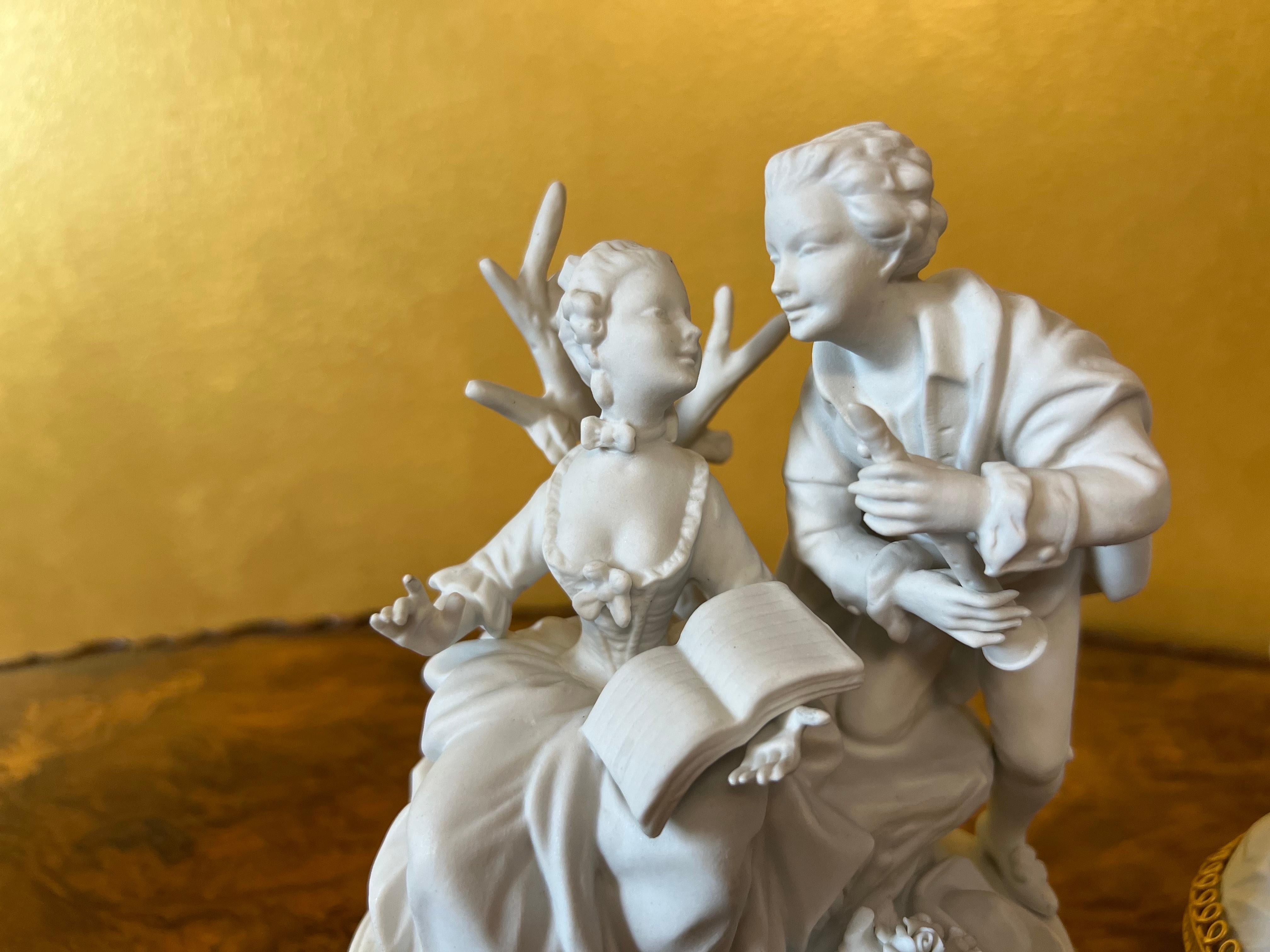Pair of Statues of Man & Women playing instruments courting each other, one a gold metal stand, both have stamp on base.

Material: Porcelain

Country Of Origin: Germany 

Measurements 18cm high, 16cm length, 8cm width

Postage via Australia Post