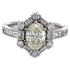 Vintage GIA 1.04 Carats Oval Cut Diamond Platinum Cluster Ring