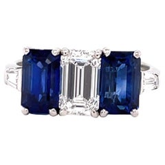 Vintage GIA 1.18 Carat Emerald Cut Diamond Sapphire Three Stone Platinum Ring
