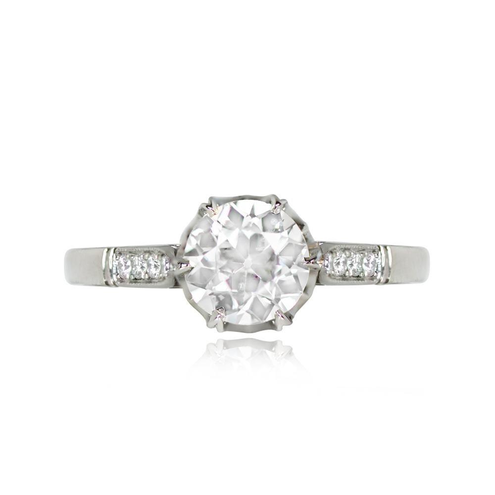 A vintage solitaire engagement ring showcases a GIA-certified 1.19-carat old European cut diamond, K color, SI1 clarity. Four additional old European cut diamonds are set along the shoulder. Hand-crafted in platinum during the 1960s, this ring
