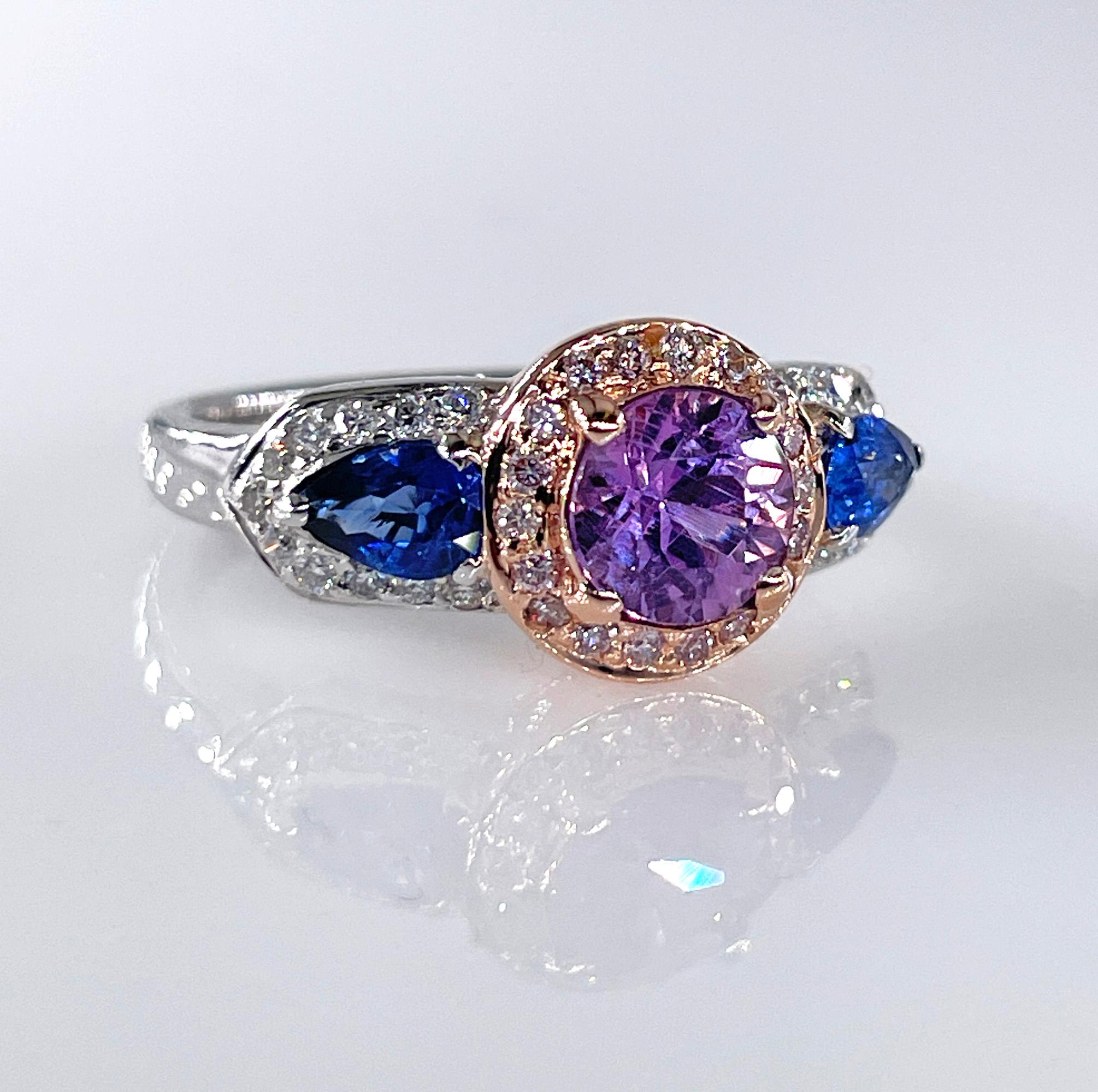 Multi-Color Sapphire Natural Pink And White Diamond Engagement Anniversary 18K White Gold Vintage Ring with GIA 1.12ct Unheated Pink Sapphire.
A symphony of rare hues. This 18k white and rose gold ring is a celebration of color, showcasing a natural
