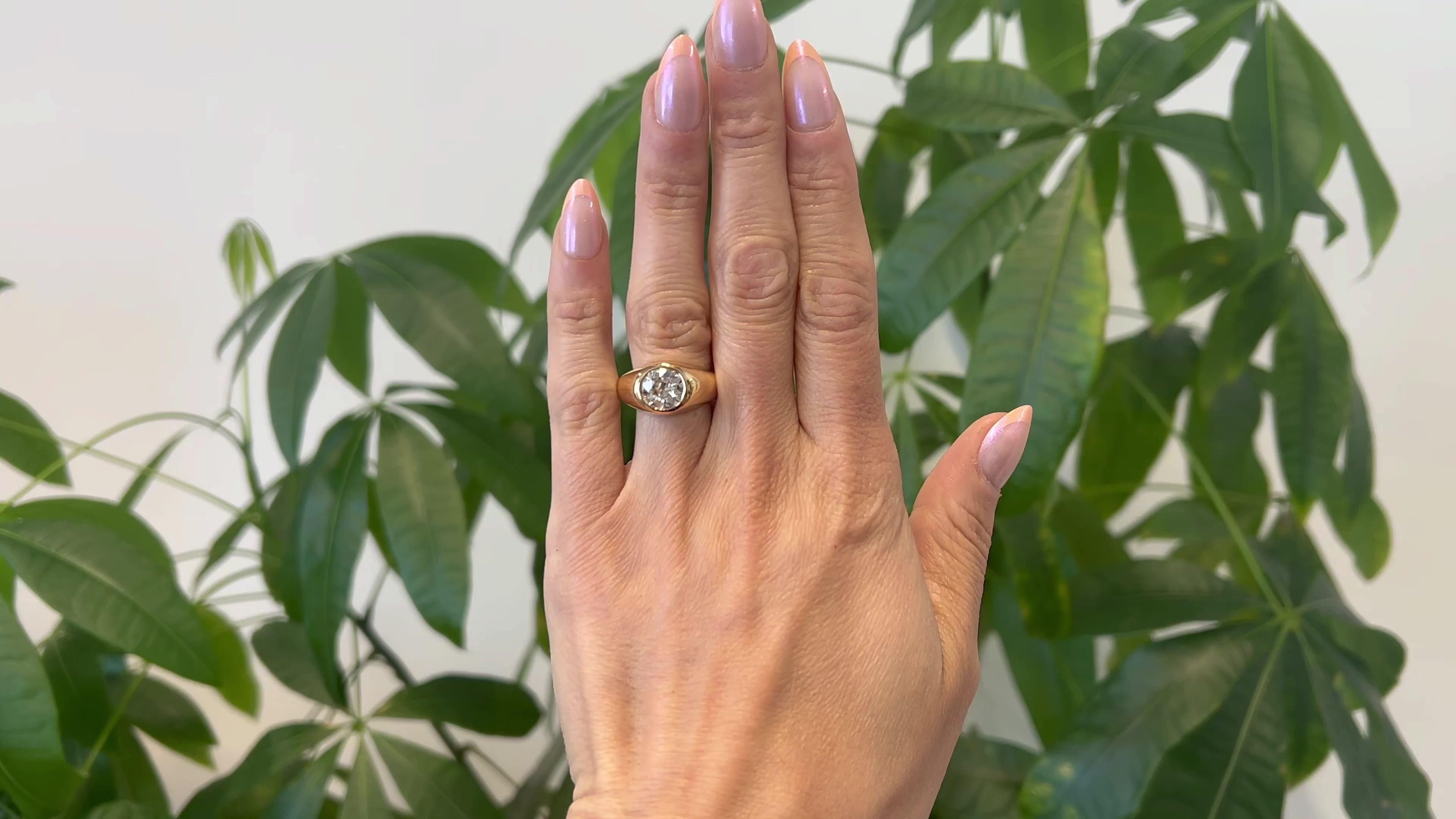 One Vintage GIA 2.29 Carat Old European Cut Diamond 18k Antique Gold Bezel Set Solitaire Ring. Featuring one GIA old European cut diamond of 2.29 carats, accompanied with GIA #5234056967 stating the diamond is M color, I2 clarity. Crafted in 18