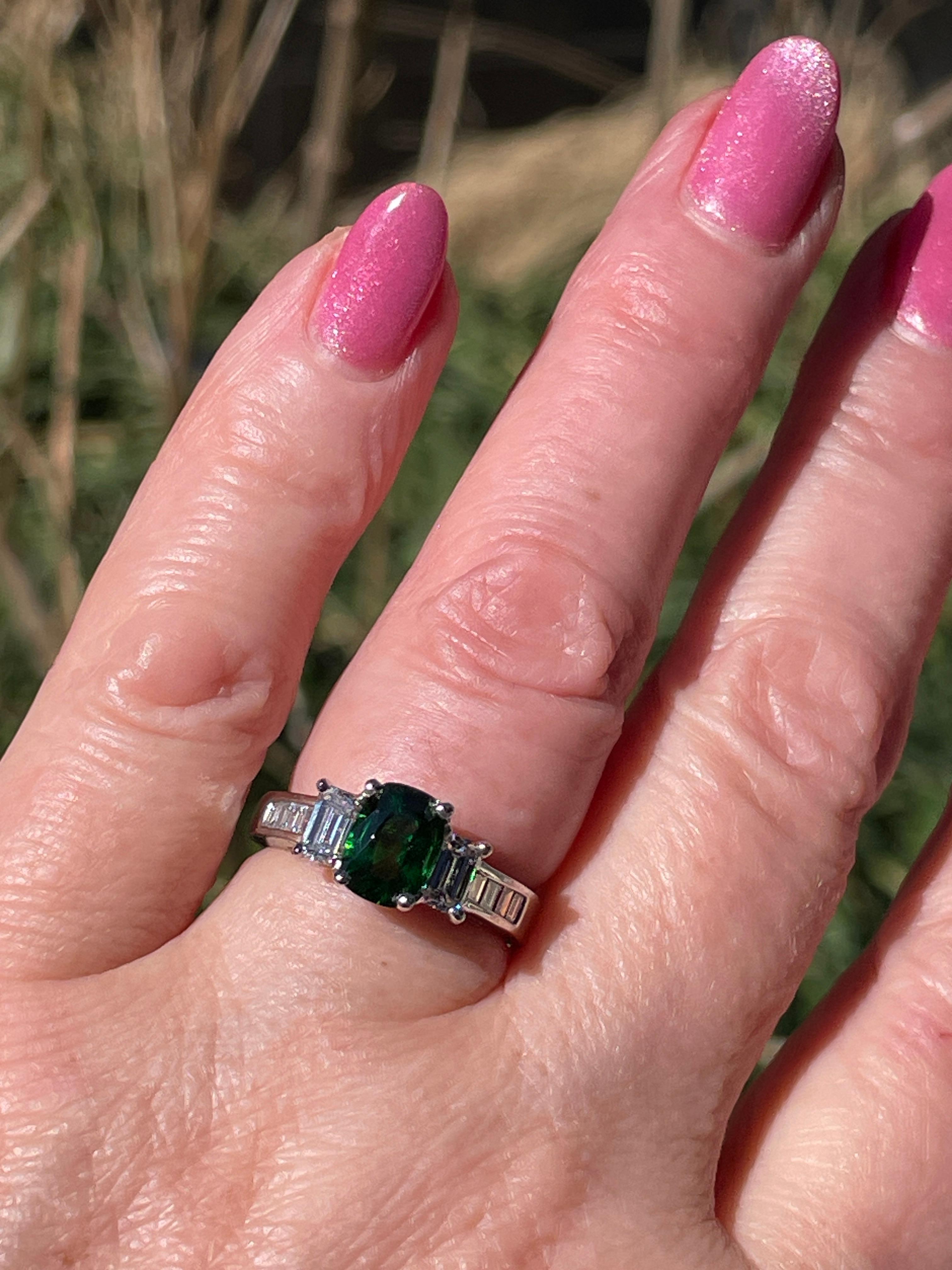 Rare Vintage GIA 2.46ctw Natural Green Cushion Cut Tsavorite Garnet and Diamond Platinum Engagement Cocktail Ring.

This fabulous vintage classic ring represents everything beloved in the straight geometric design. But it is softened by elongated