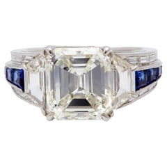 Retro GIA 4.54 Carat Emerald Cut Diamond Sapphire Platinum Ring