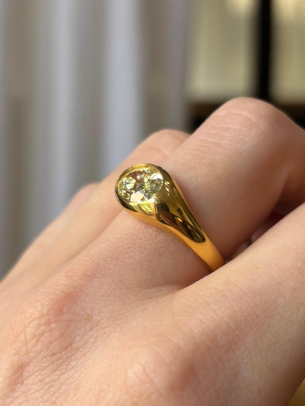 Vintage GIA Certified 2.03ct Fancy Yellow Oval Diamond Bezel Set Ring For Sale 5