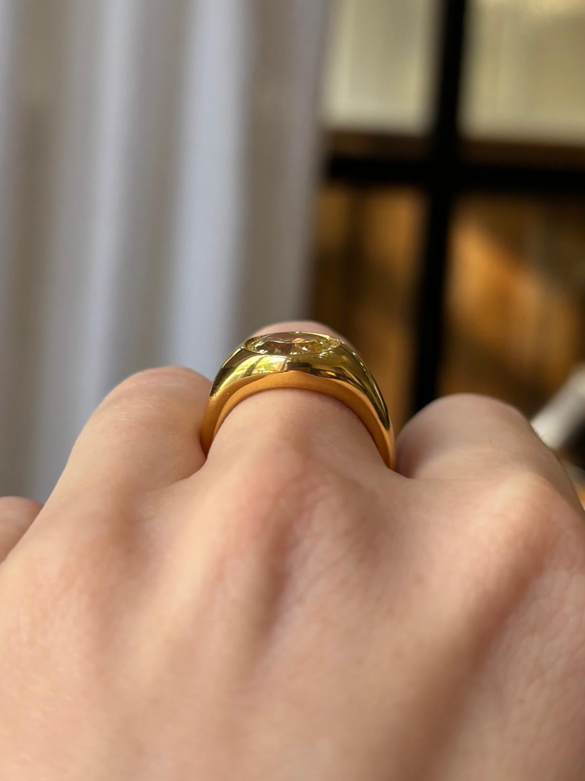 Vintage GIA Certified 2.03ct Fancy Yellow Oval Diamond Bezel Set Ring For Sale 6