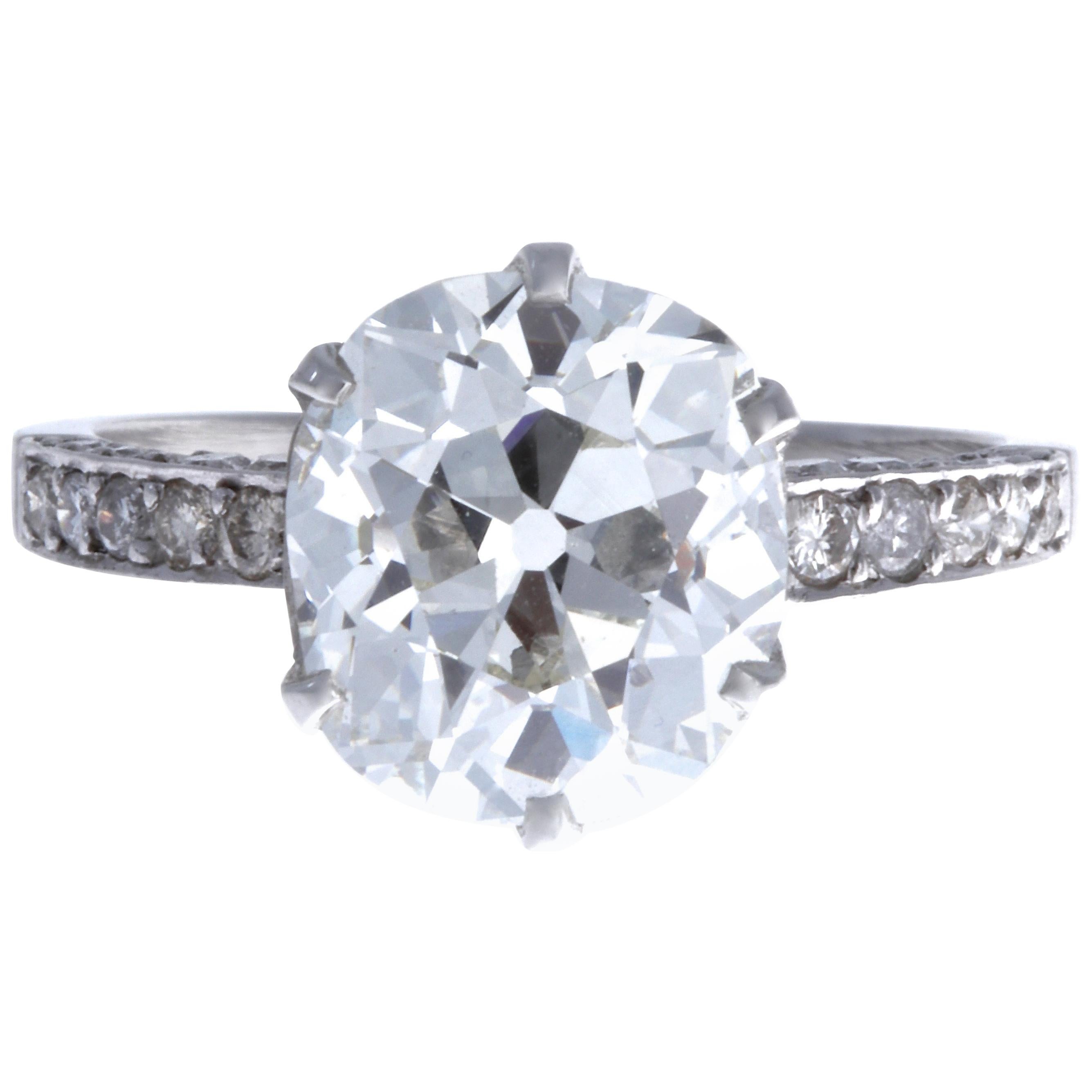 The ultimate vintage engagement ring. The perfect diamond, setting and the stunning band, all make a dream ring. No matter where you go, this ring is definitely eye-catching. The GIA certified antique cushion cut diamond is 4.31 carats, J color, VS2