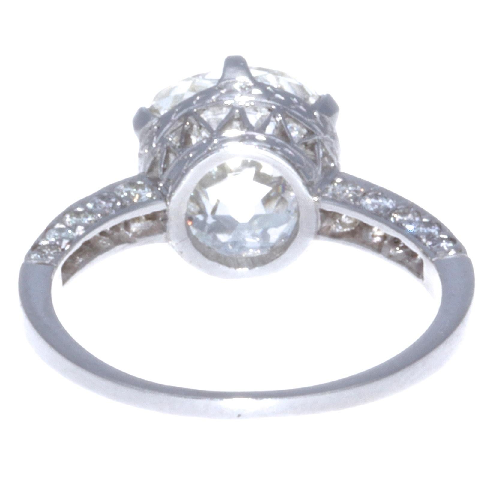 Women's Vintage GIA Certified 4.31 Carat Antique Cushion Cut Diamond Platinum Ring
