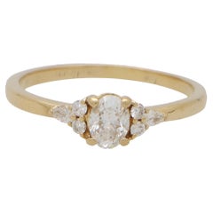 Vintage GIA Certified Oval Cut Diamond Ring Set in 18k Yellow Gold