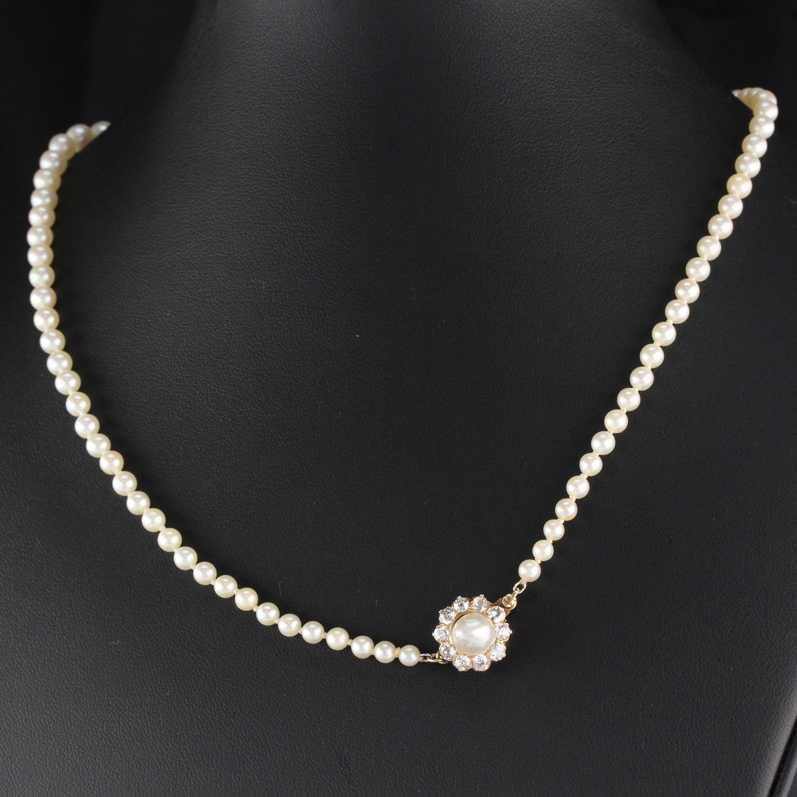 Vintage GIA Certified Pearl Necklace includes 83 graduated cultured pearls ranging from 3.6mm to 7.69mm. The clasp is 14 karat yellow gold with one natural pearl (Pinctada Fucata, akoya pearl oyster) center surrounded by ten old- European brilliant