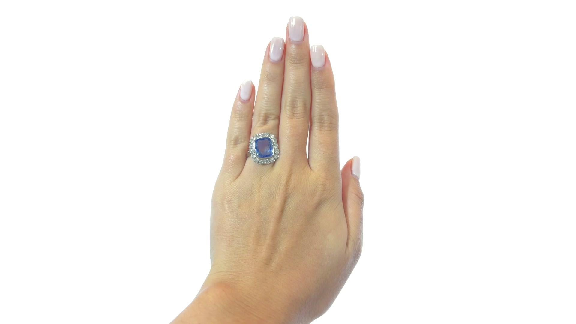 Vintage GIA French Sapphire Diamond Cluster Ring. The main gem is a GIA certified cushion cut sapphire Ceylon origin with no indications of heat or other treatments. Weight approximately 5.10 carats. Accented by 16 Old European Cut diamonds