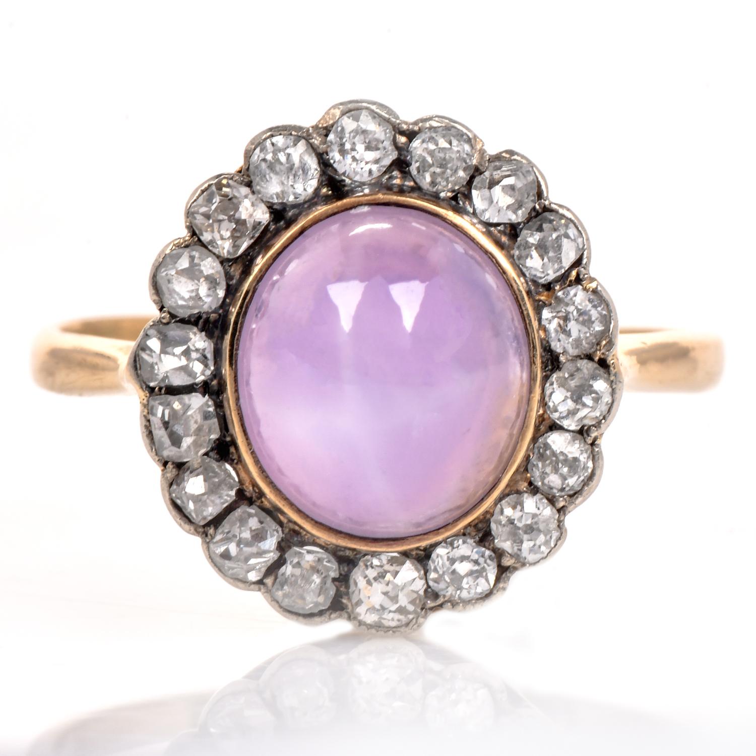 A Classic vintage Halo band adorned with diamonds and sapphire, crafted in 18K yellow gold.
GIA Certified Pink-Purple Star Cabochon Oval Sapphire is the heart of the Ring with single-cut natural halo set diamonds
GIA report #6183600501 
Metal: 18K