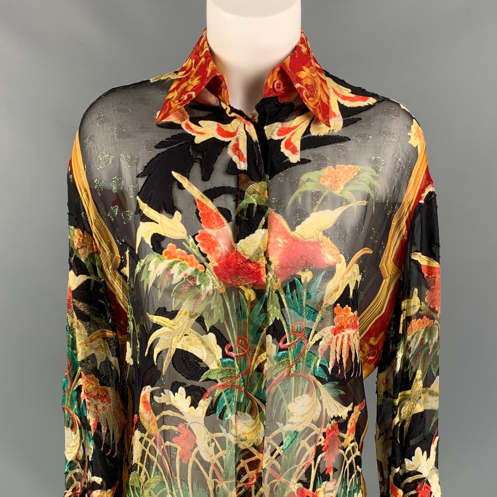 Vintage GIANFRANCO FERRE blouse comes in a multi-color see through floral silk featuring a oversized fit, spread collar, and a hidden button closure. Made in Italy. 

Very Good Pre-Owned Condition.
Marked: Size tag removed.

Measurements:

Shoulder:
