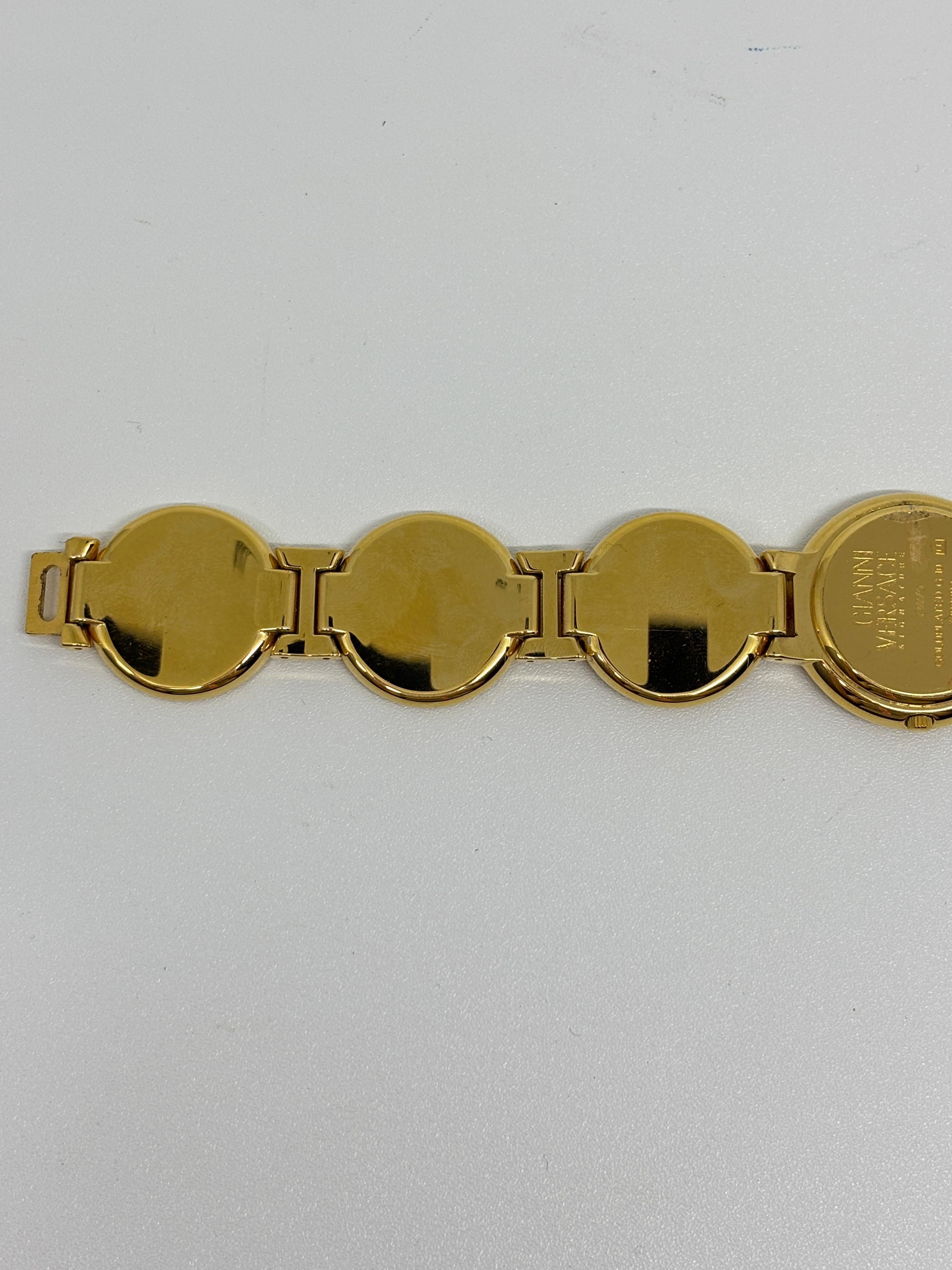 Vintage Gianni Versace Gold Medusa Coin Watch en vente 4