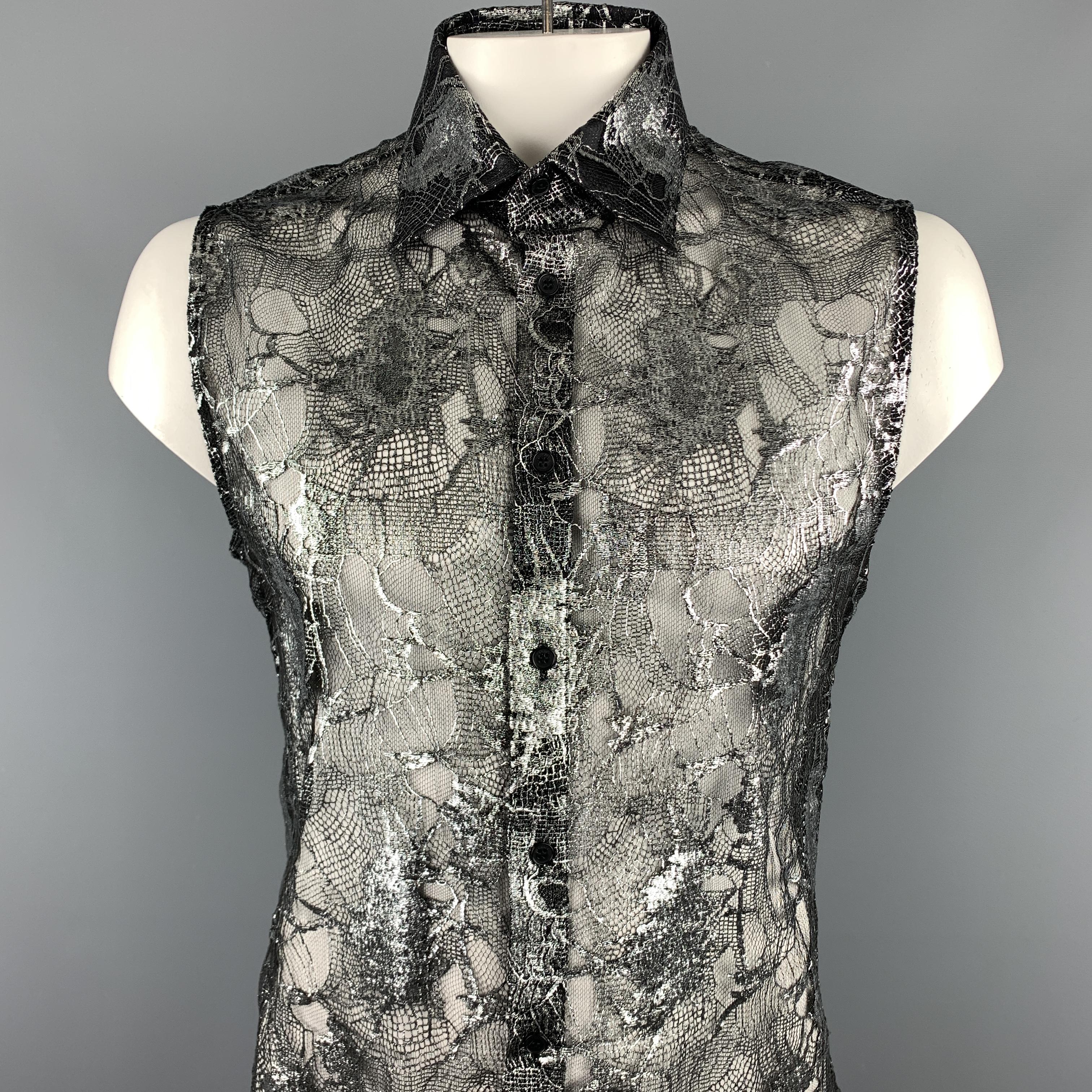 Vintage GIANNI VERSACE sleeveless shirt comes in a black & silver lace silk blend featuring a button up style and a spread collar. Made in Italy.

Excellent Pre-Owned Condition.
Marked: IT 56

Measurements:

Shoulder: 17 in. 
Chest: 44 in. 
Length: