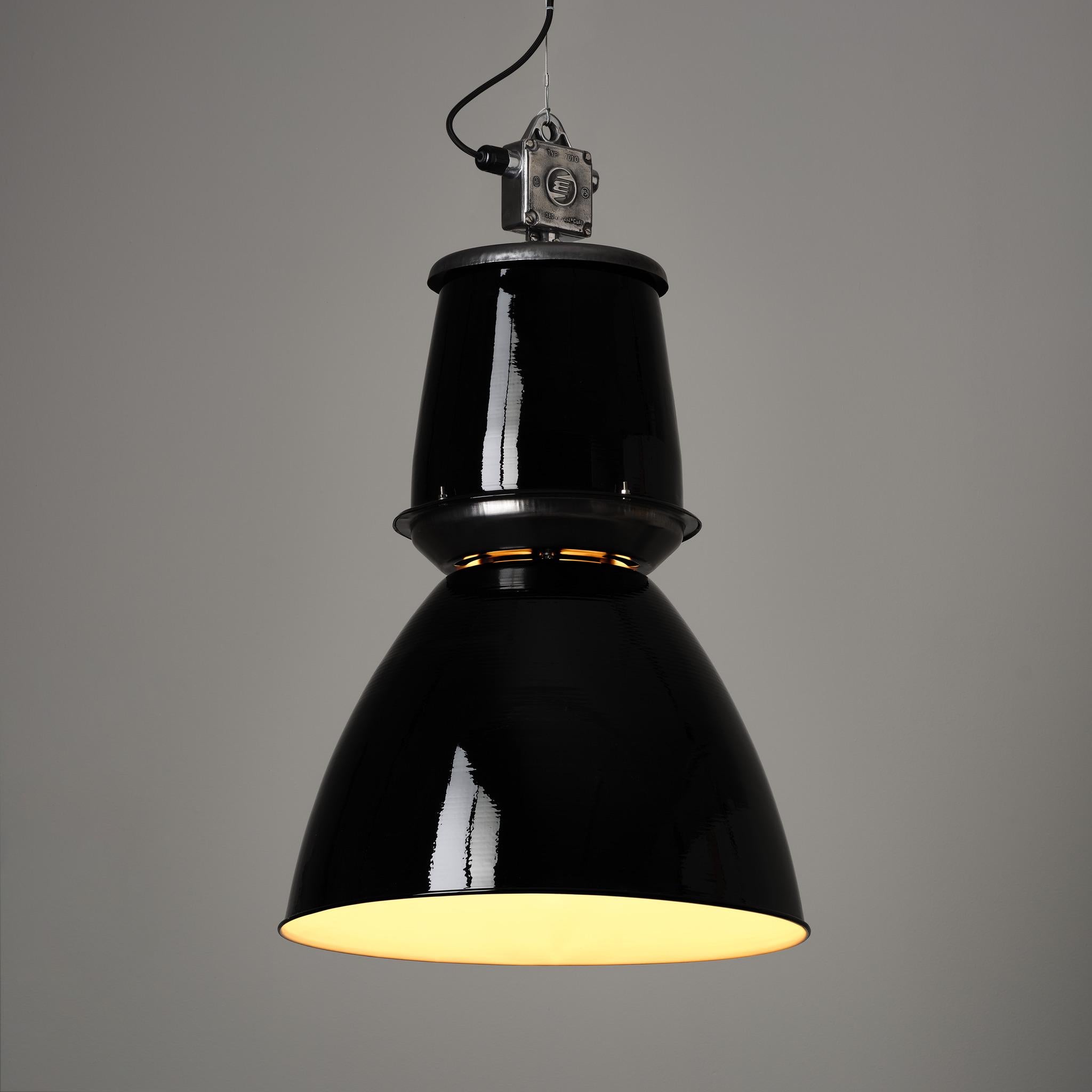 Substantial vintage industrial pendant lights reclaimed from communist-era factories in the Czech Republic. An Eastern Bloc design classic.

Supplied with a repainted shade and polished metalwork.

Finishes: Gloss Black (RAL 9011)/ Gloss Grey