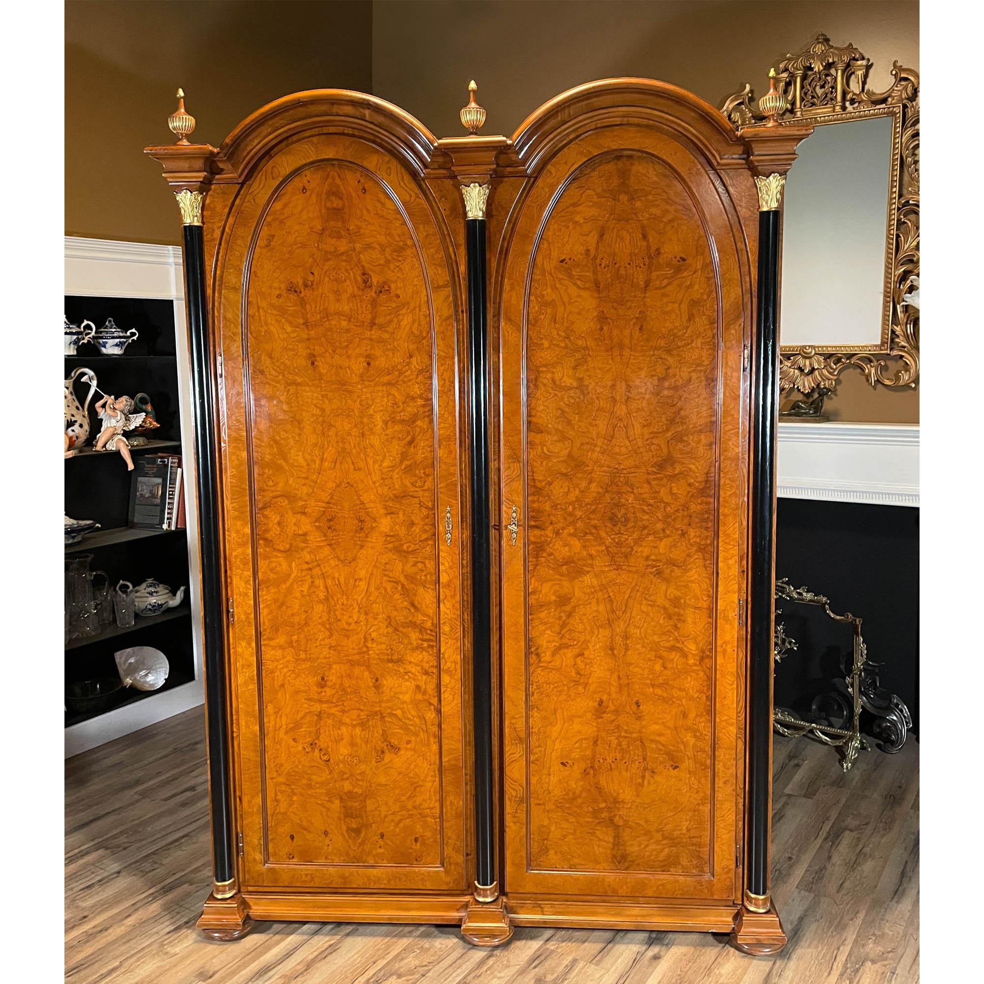 The Vintage Giemme Bar Cabinet was produced in Italy and is brought to you now by Niagara Furniture. The bar cabinet has a lot of great features that combine to make it a show stopper. With finely detailed burled veneers throughout the cabinet is