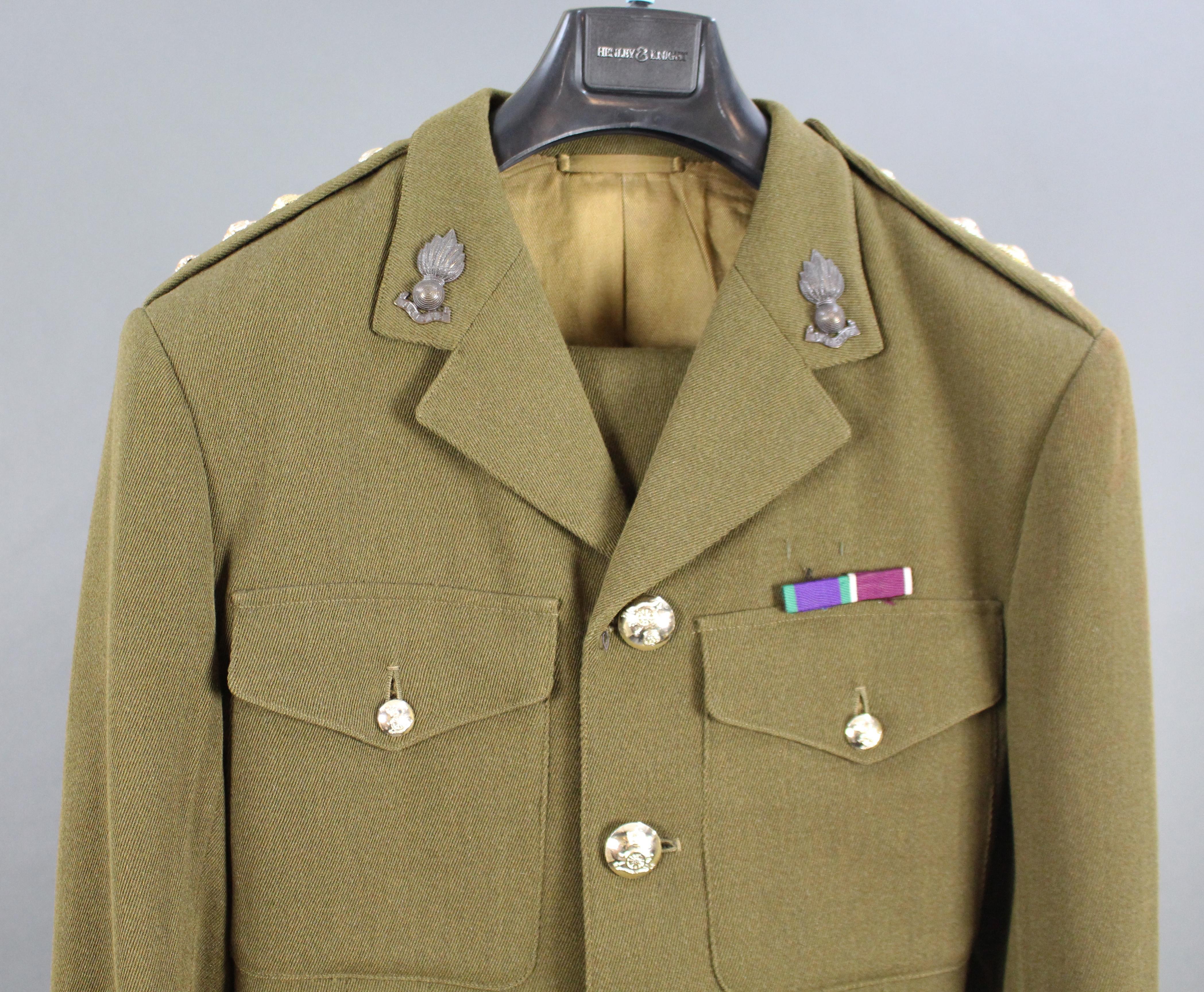 Period Artillery Uniform
Maker Gieves & Hawkes
Rank Captain
Condition: Very good condition. One or two pulls to the thread
Underarm length 20 in
Arm (shoulder - cuff) 27 in
Back (shoulder - shoulder) 18 in
Length (seam - hem) 33 in
Trousers