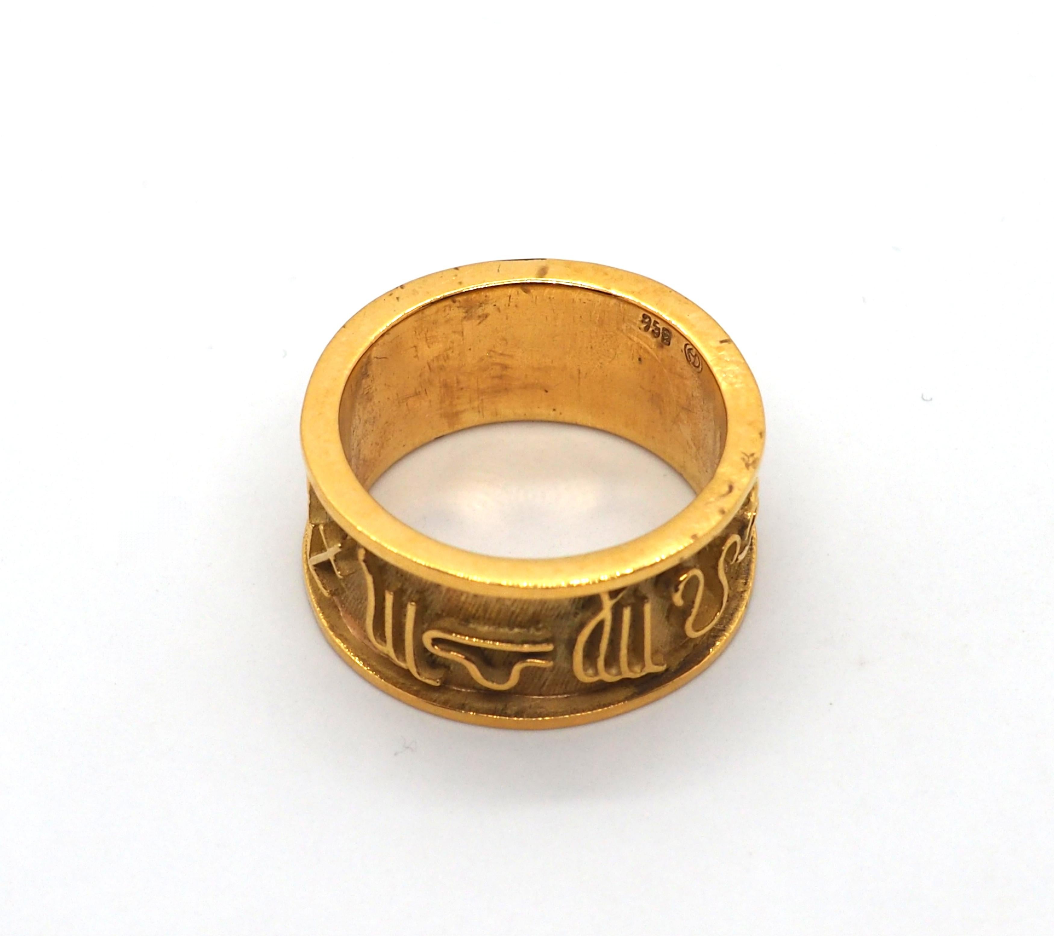 Embrace the timeless allure of vintage craftsmanship with this Gilbert Albert 18K yellow gold ring, featuring the twelve astrological signs. Each intricately detailed sign is a testament to Gilbert Albert's artistic vision and mastery.

Crafted with