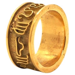Anello con segni astrologici d'epoca di Gilbert Albert in oro giallo 18 carati