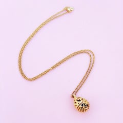 Vintage Gilded Filigree Caged Egg Pendant Necklace by Joan Rivers, 1990s