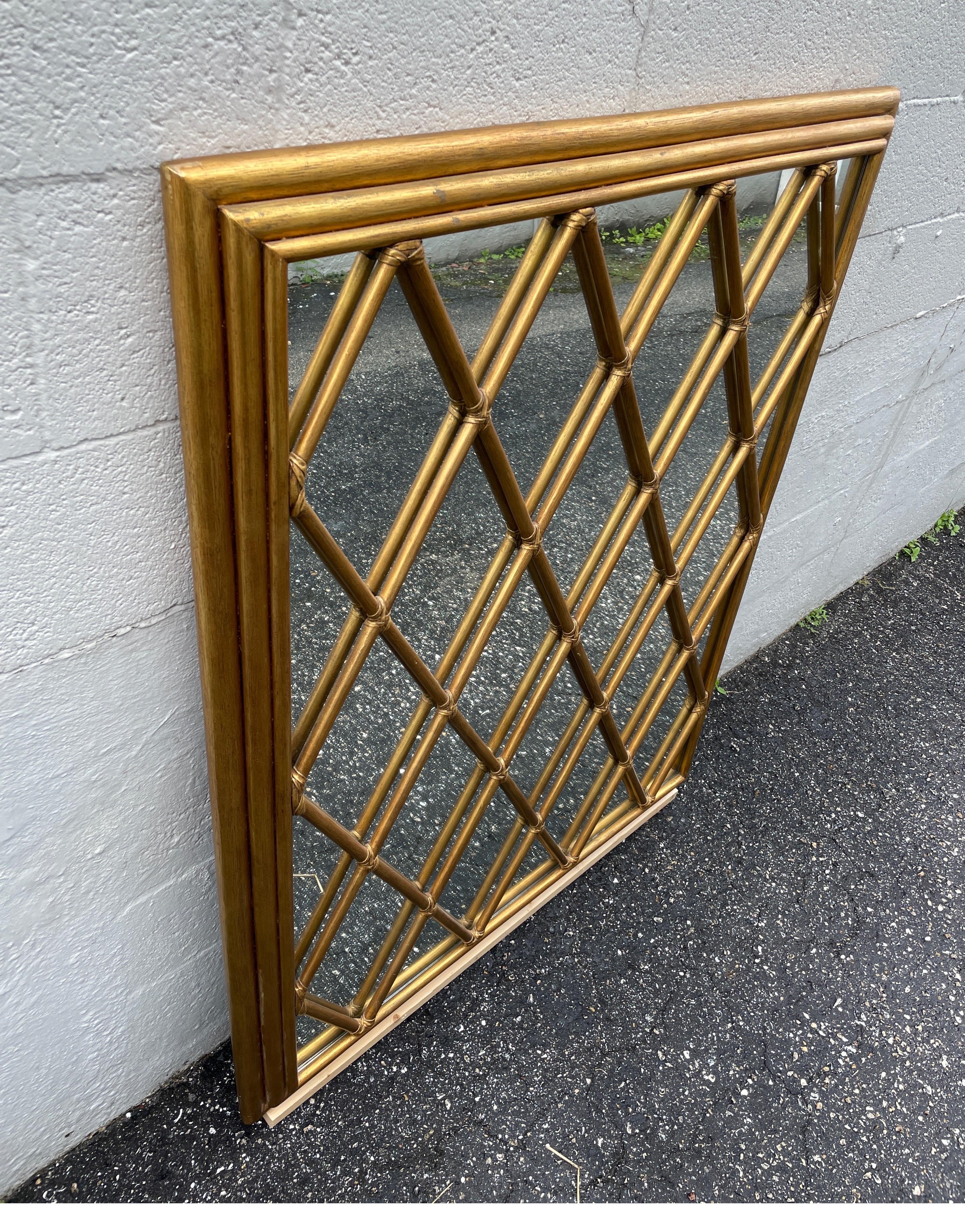 American Vintage Gilded Rattan Harlequin Mirror by Mc Guire For Sale