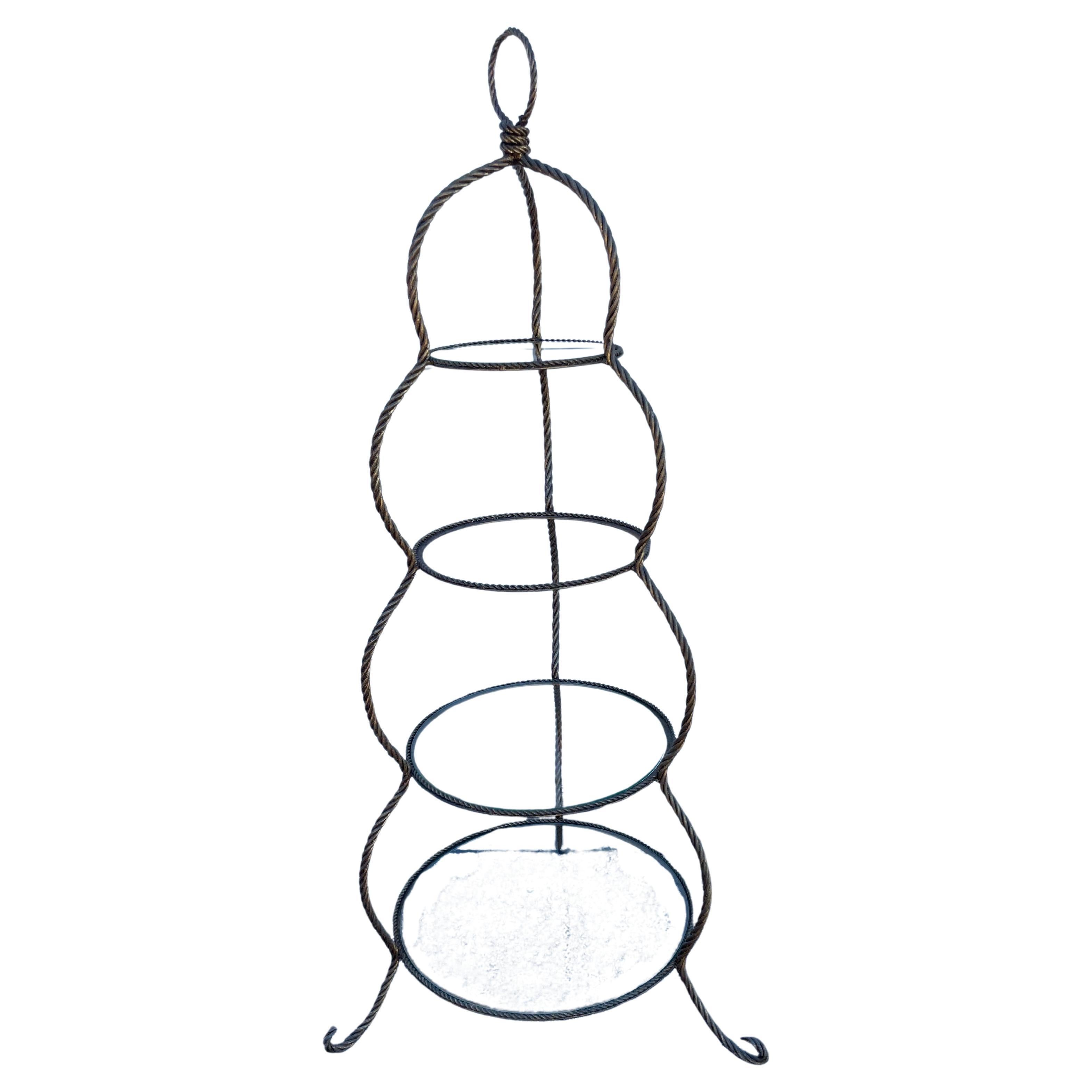 Etagere a quattro piani in ferro dorato a forma di corda