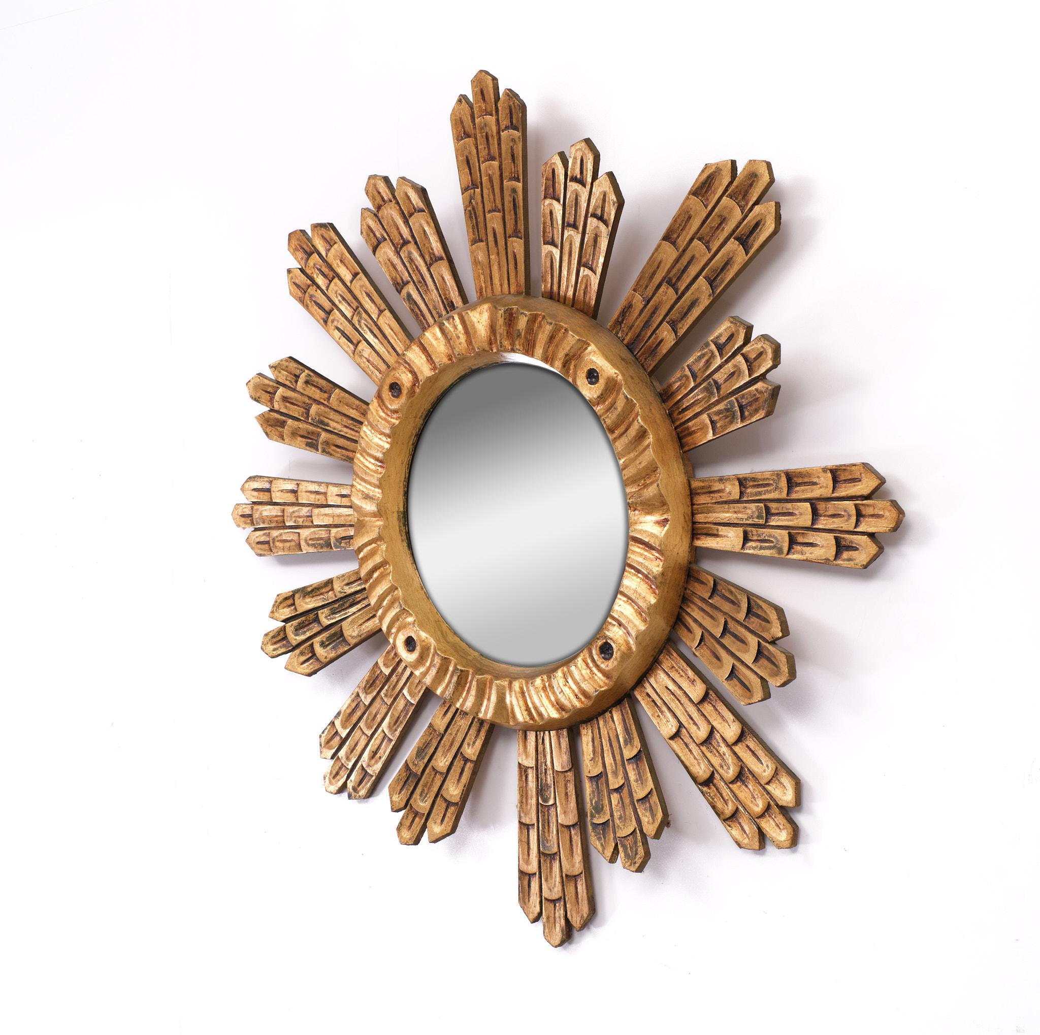 Very nice Sunburst Mirror. Gilded Gold Wood  . So decorative .
1970s  