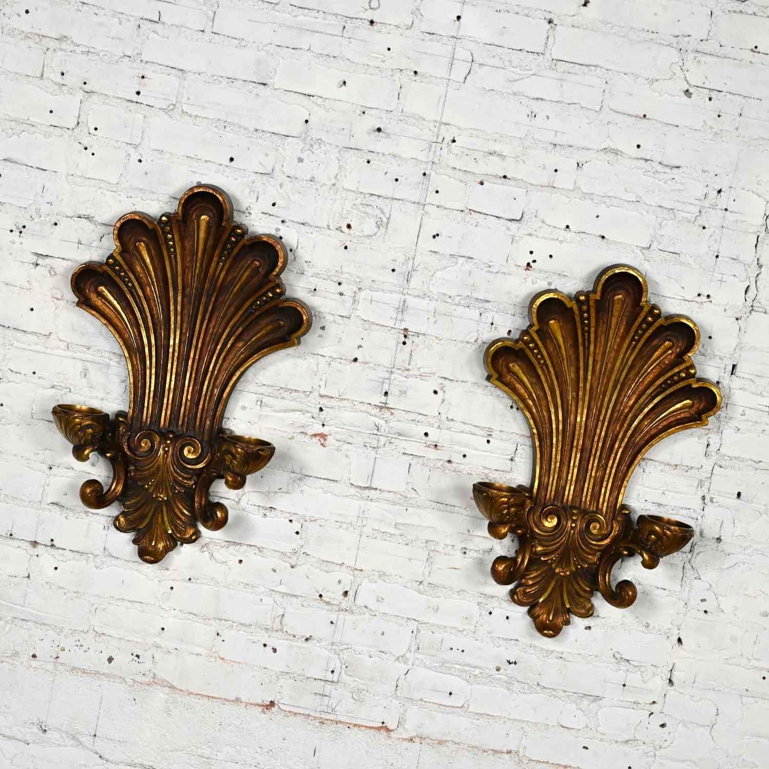 Fabulous vintage gilded Syroco Hollywood Regency double candle wall sconces, a pair. Beautiful condition, keeping in mind that these are vintage and not new so will have signs of use and wear. Please see photos and zoom in for details. We attempt to