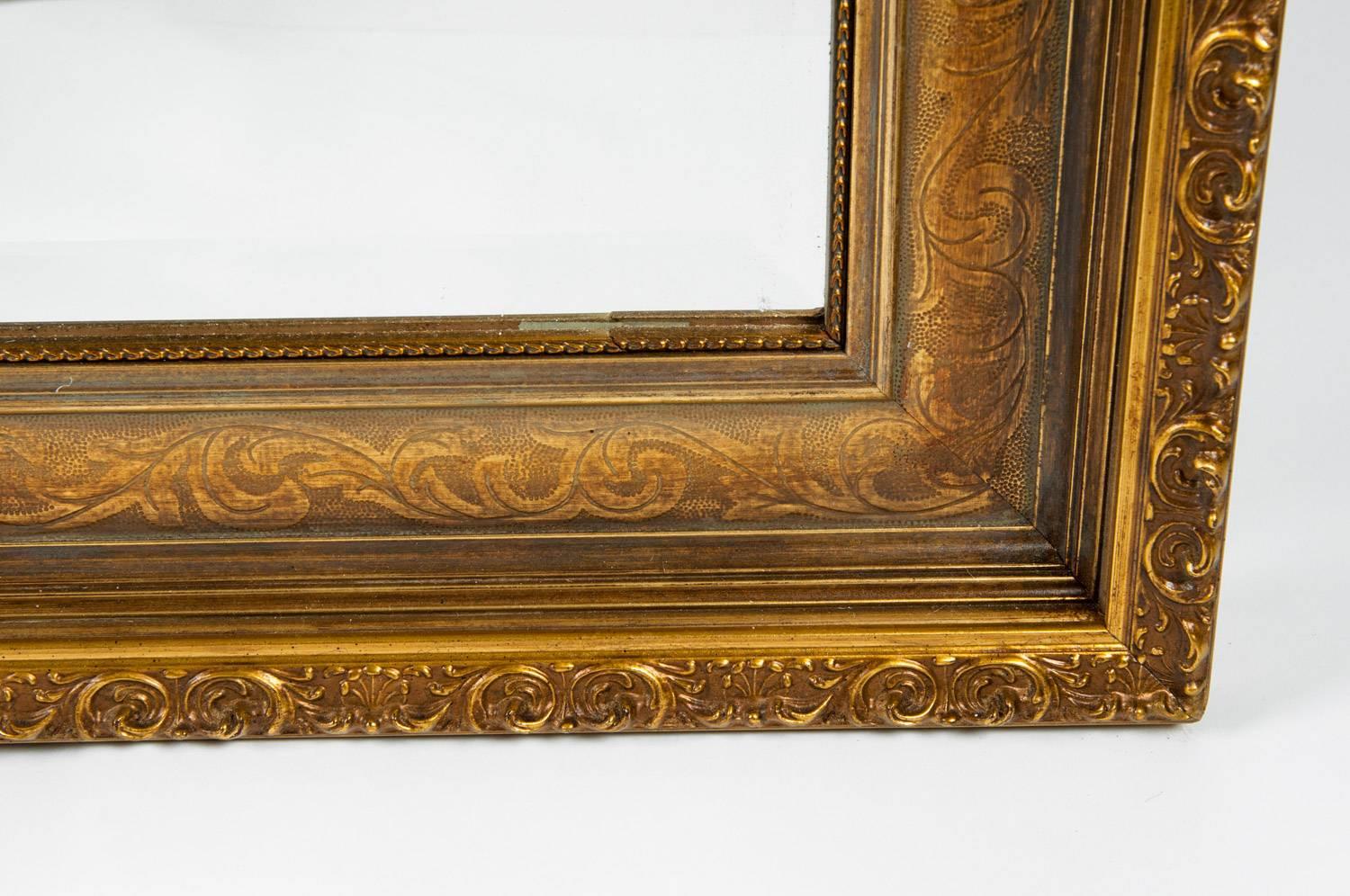 Vintage Gilded Wood Framed Hanging Wall Mirror In Excellent Condition In Tarry Town, NY