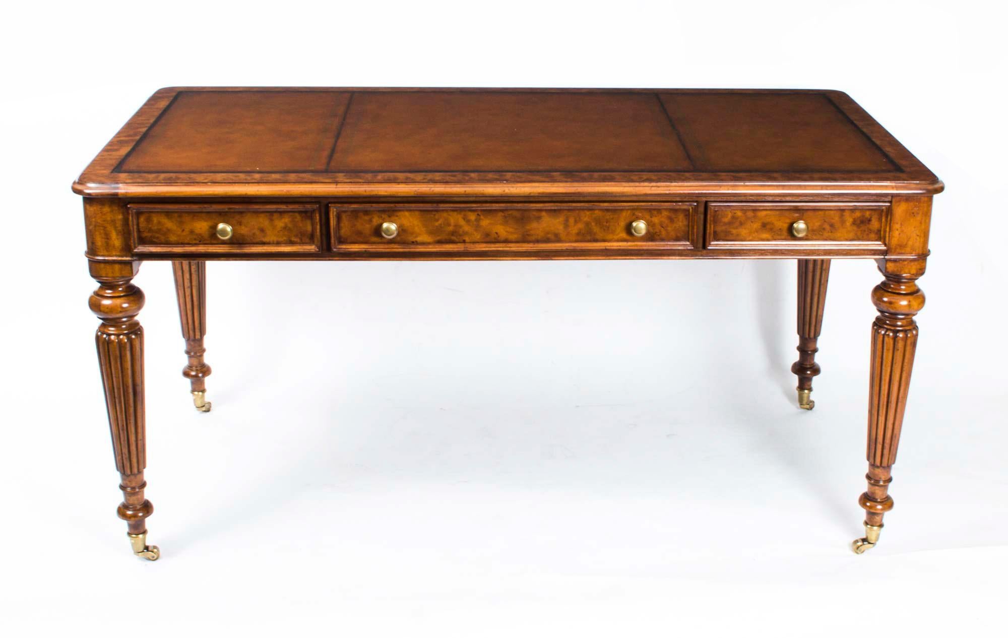 This is a sublime vintage burr walnut writing table in the manner of Gillows dating from the late 20th century.

This elegant desk will make a wonderful addition to one room in your home, it has been crafted from beautiful burr walnut and features