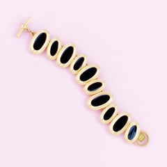 Bracelet à maillons ovale organique vintage doré & en émail noir par Anne Klein:: 1980