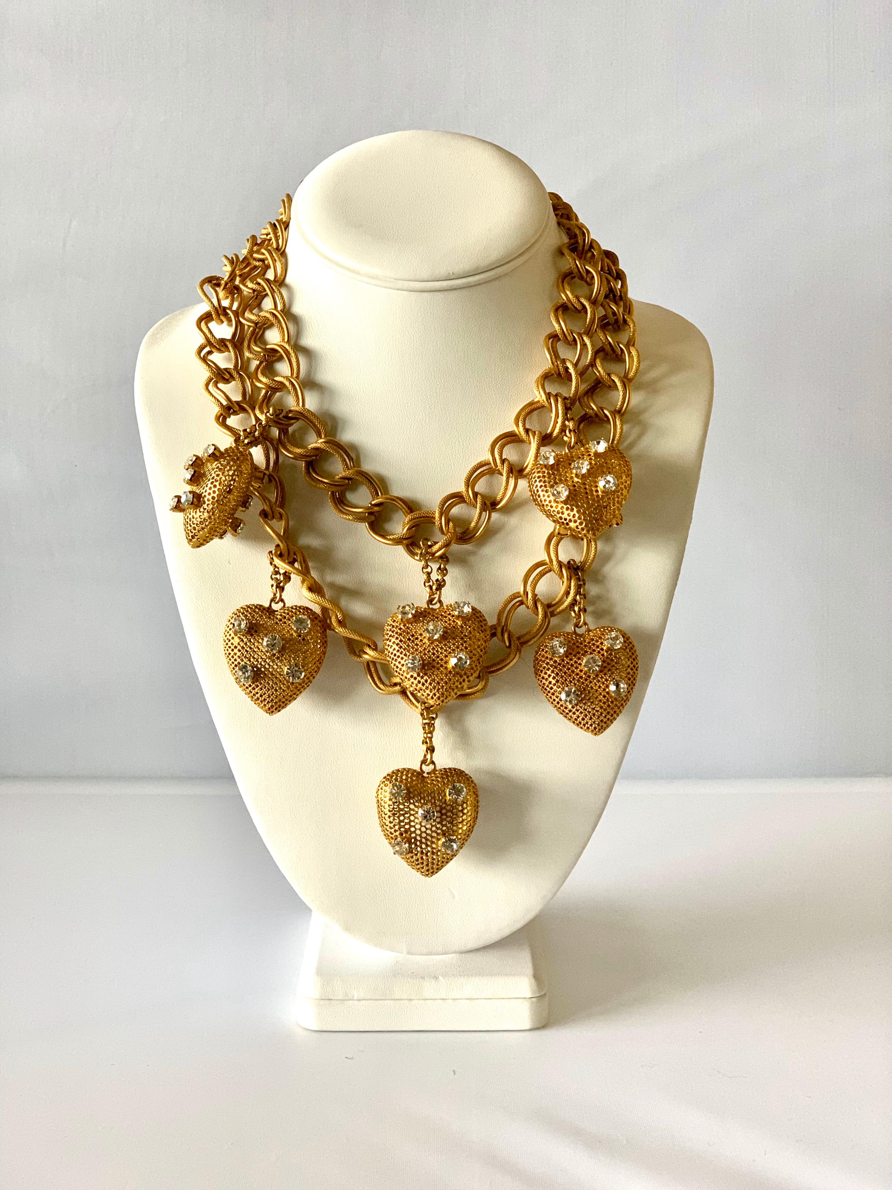 Vintage gilt chain and diamante heart bib statement necklace - comprised out of two chunky gold-tone chains which are adorned by six three-dimensional hearts covered in rhinestones. The necklace was designed by Dominique Aurientis, Paris, circa